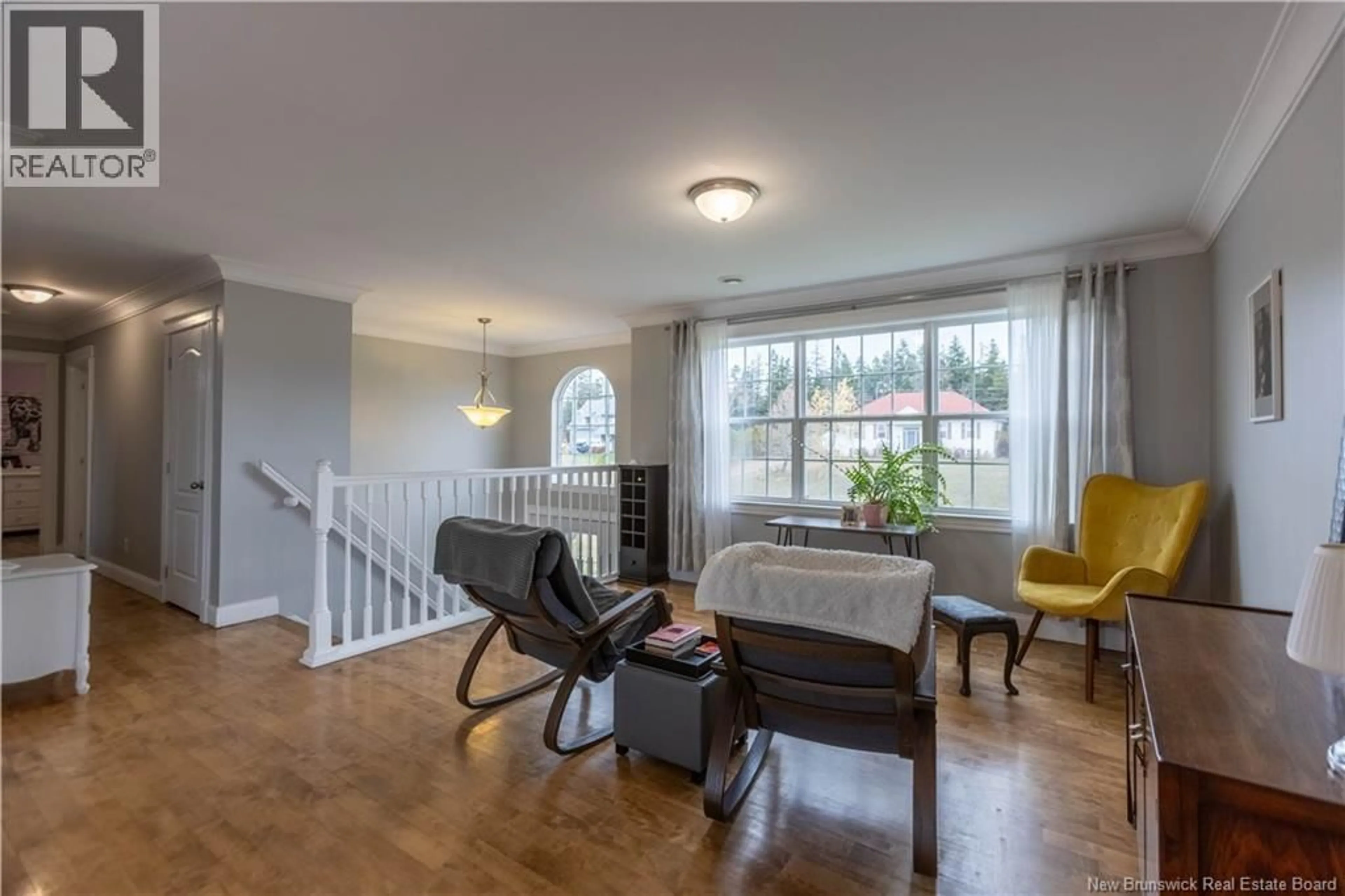 Living room with furniture, wood/laminate floor for 34 RIDGEWOOD DRIVE, Sackville New Brunswick E4L4T5