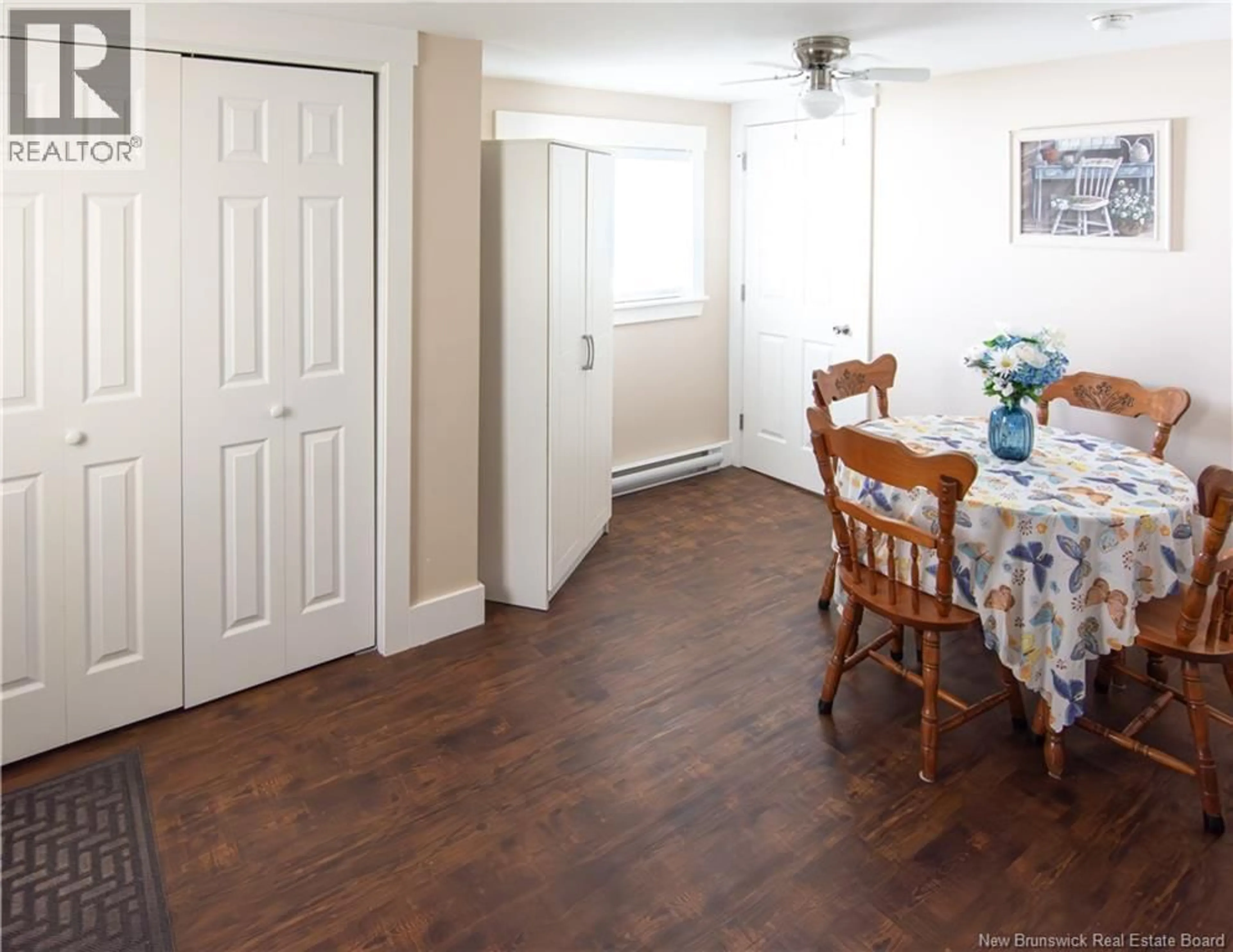 Dining room, wood/laminate floor for 23 DUPUIS AVENUE, Lakeville New Brunswick E1H1E1