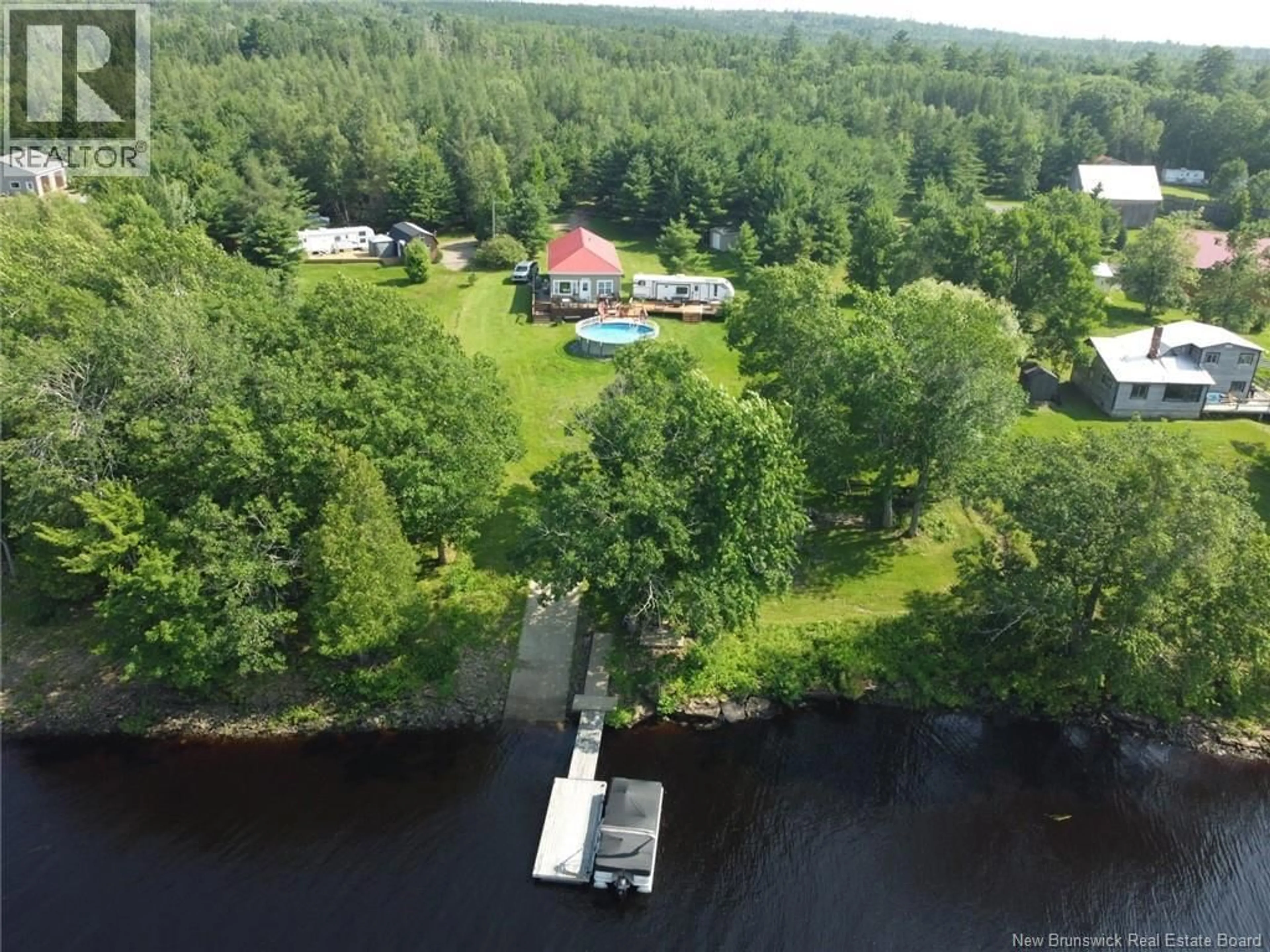 A pic from outside/outdoor area/front of a property/back of a property/a pic from drone, water/lake/river/ocean view for 12 BLUEBERRY LANE, Cambridge-Narrows New Brunswick E4C3J2