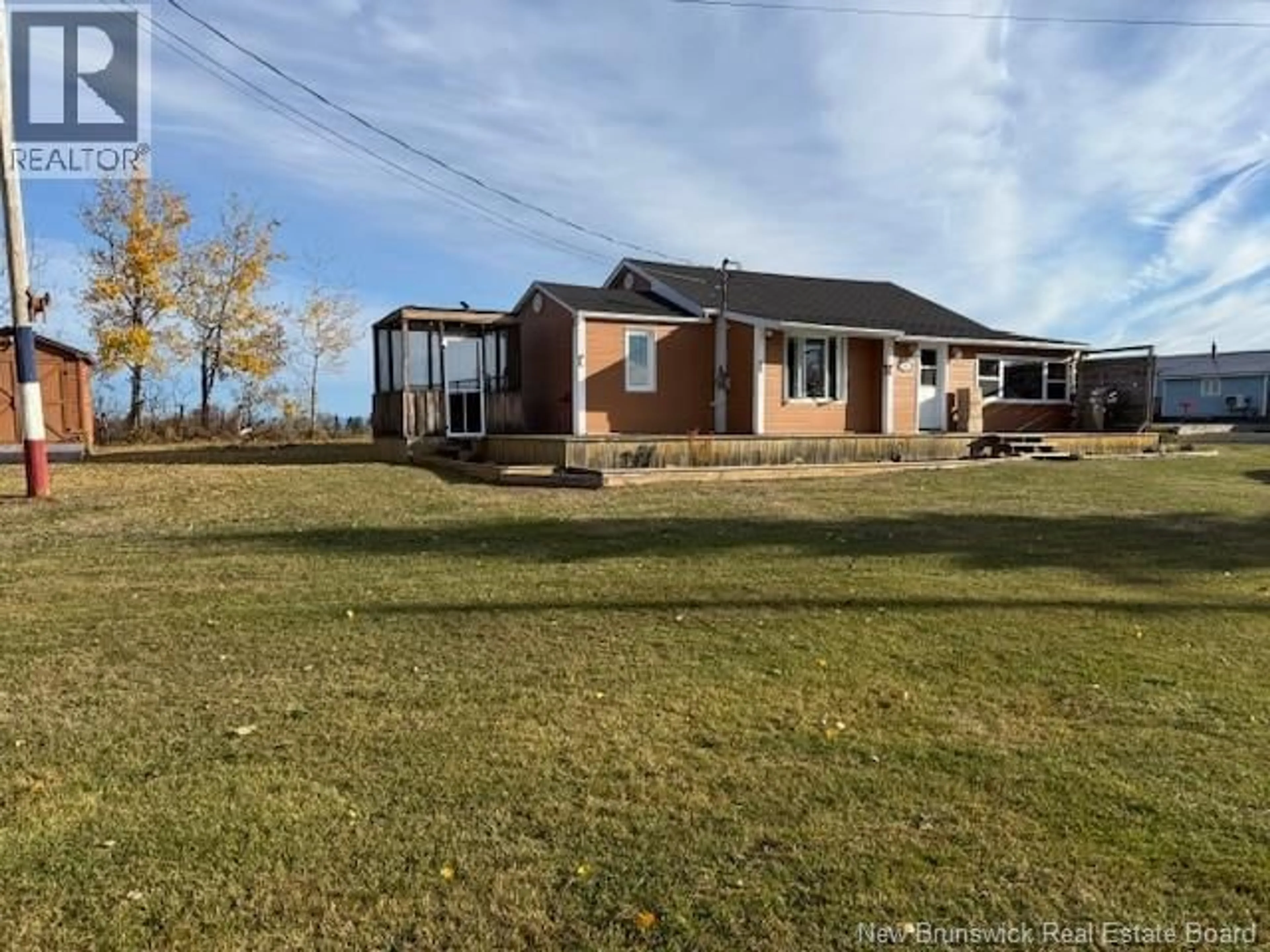 A pic from outside/outdoor area/front of a property/back of a property/a pic from drone, water/lake/river/ocean view for 61 LAVIOLETTE ROAD, Belledune New Brunswick E8G2G3