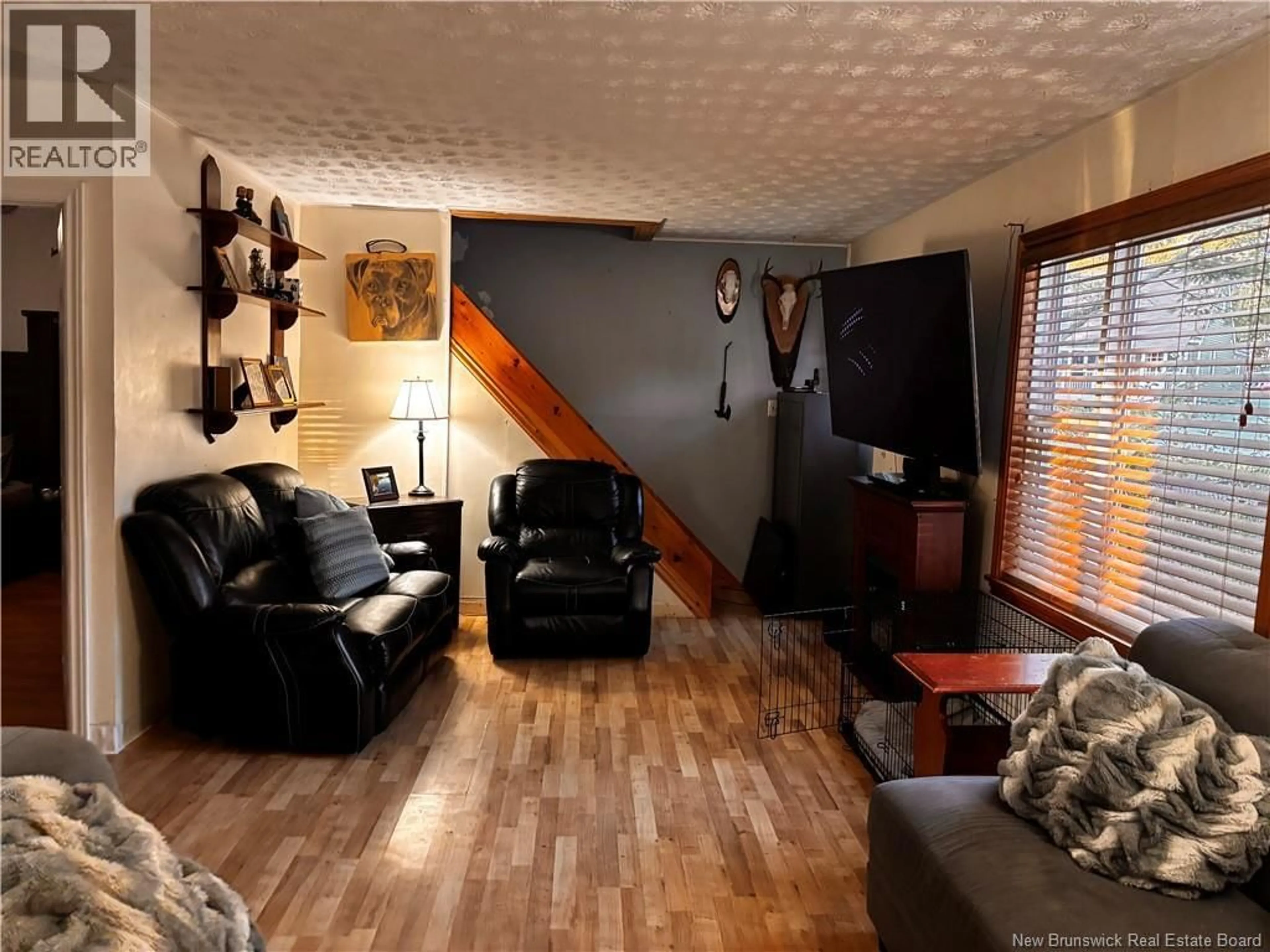 Living room with furniture, wood/laminate floor for 105 BEAVERBROOK AVENUE, Saint John New Brunswick E2K2W8