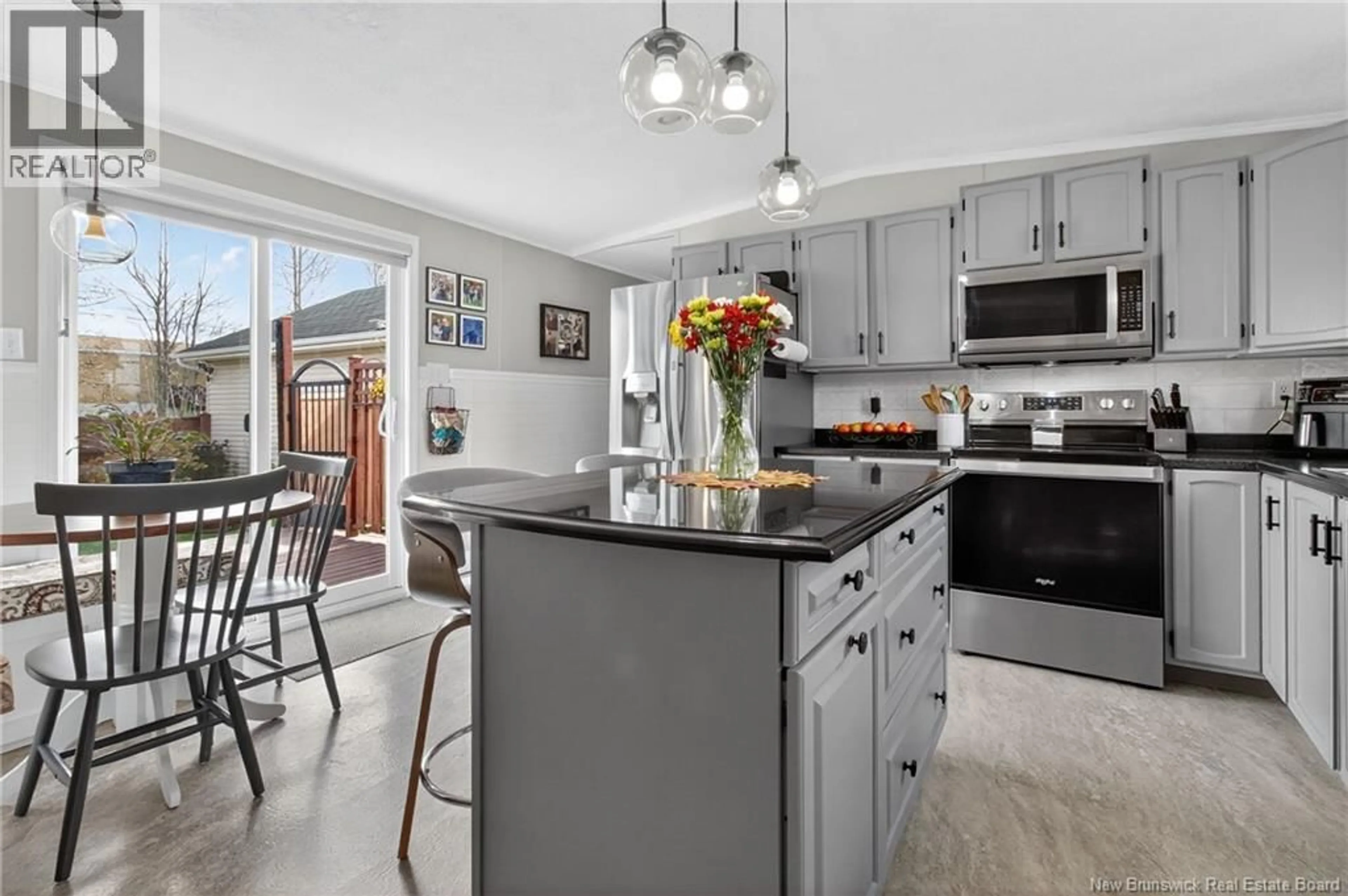 Open concept kitchen, ceramic/tile floor for 22 RESTIGOUCHE, Dieppe New Brunswick E1A7N1