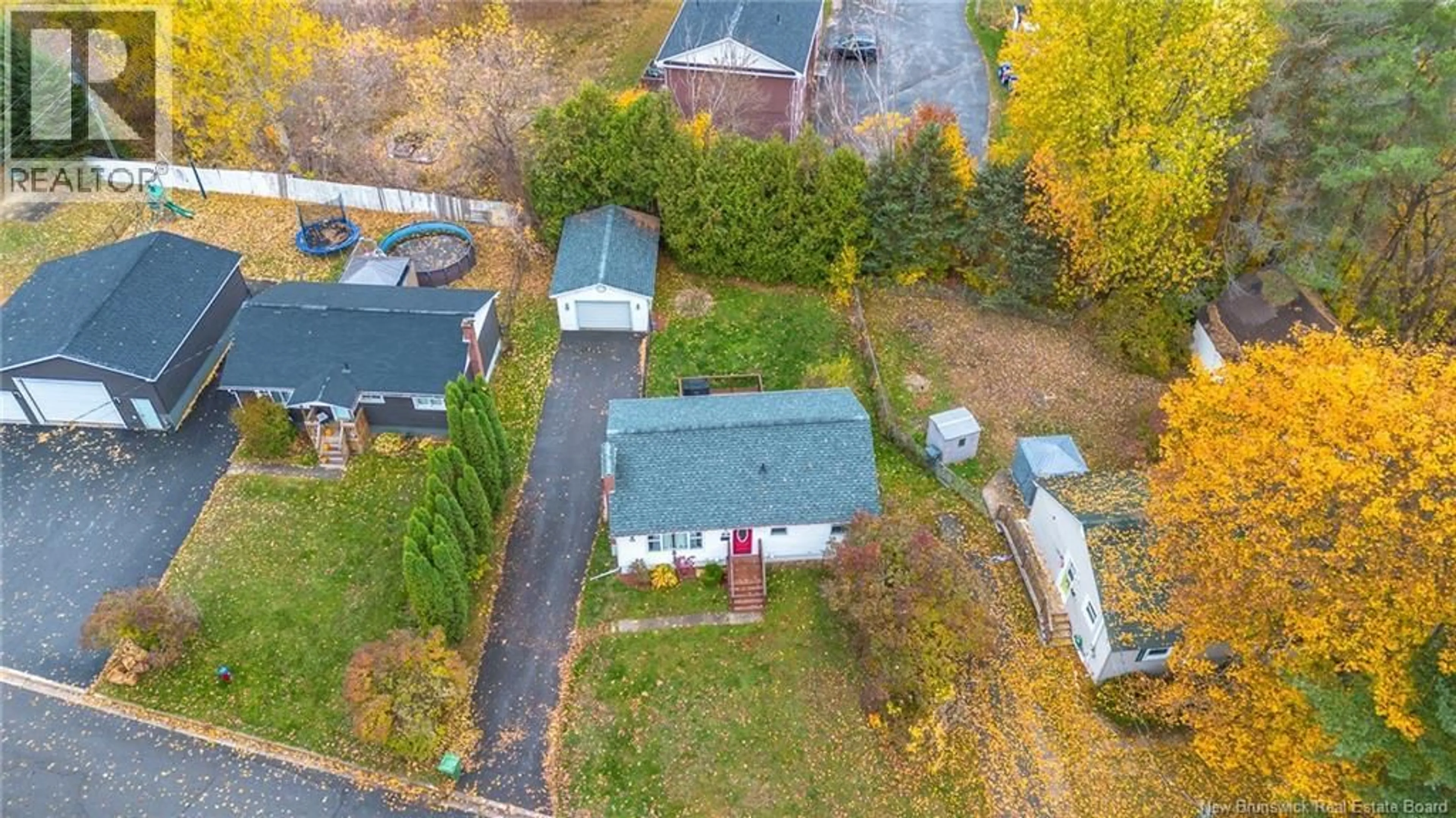 A pic from outside/outdoor area/front of a property/back of a property/a pic from drone, street for 208 MCNEILL AVENUE, Fredericton New Brunswick E3A1J6