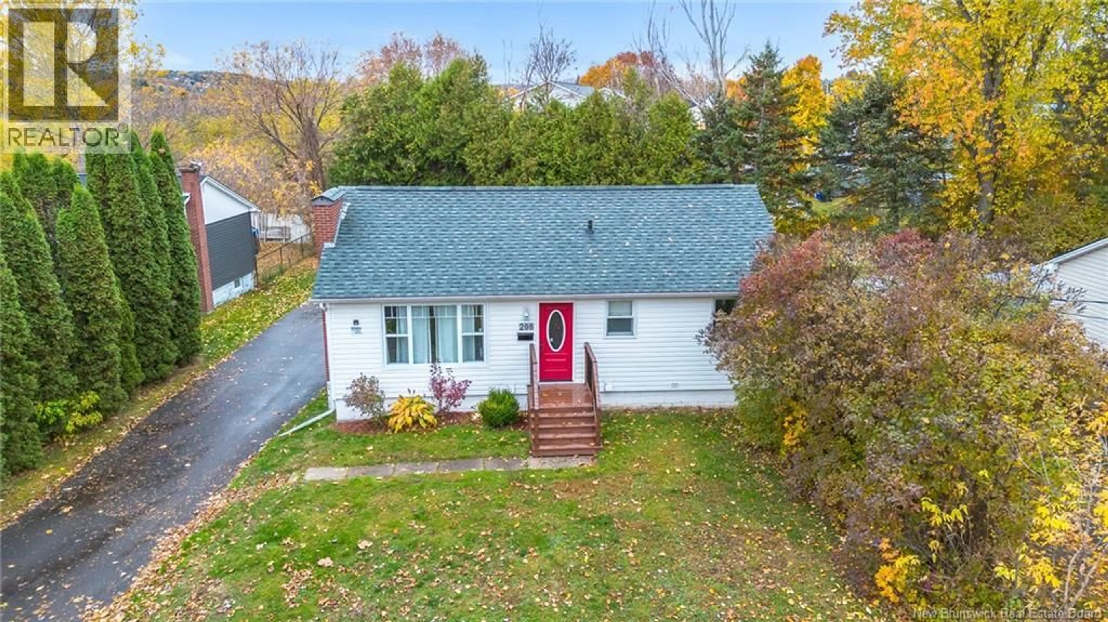 A pic from outside/outdoor area/front of a property/back of a property/a pic from drone, street for 208 MCNEILL AVENUE, Fredericton New Brunswick E3A1J6