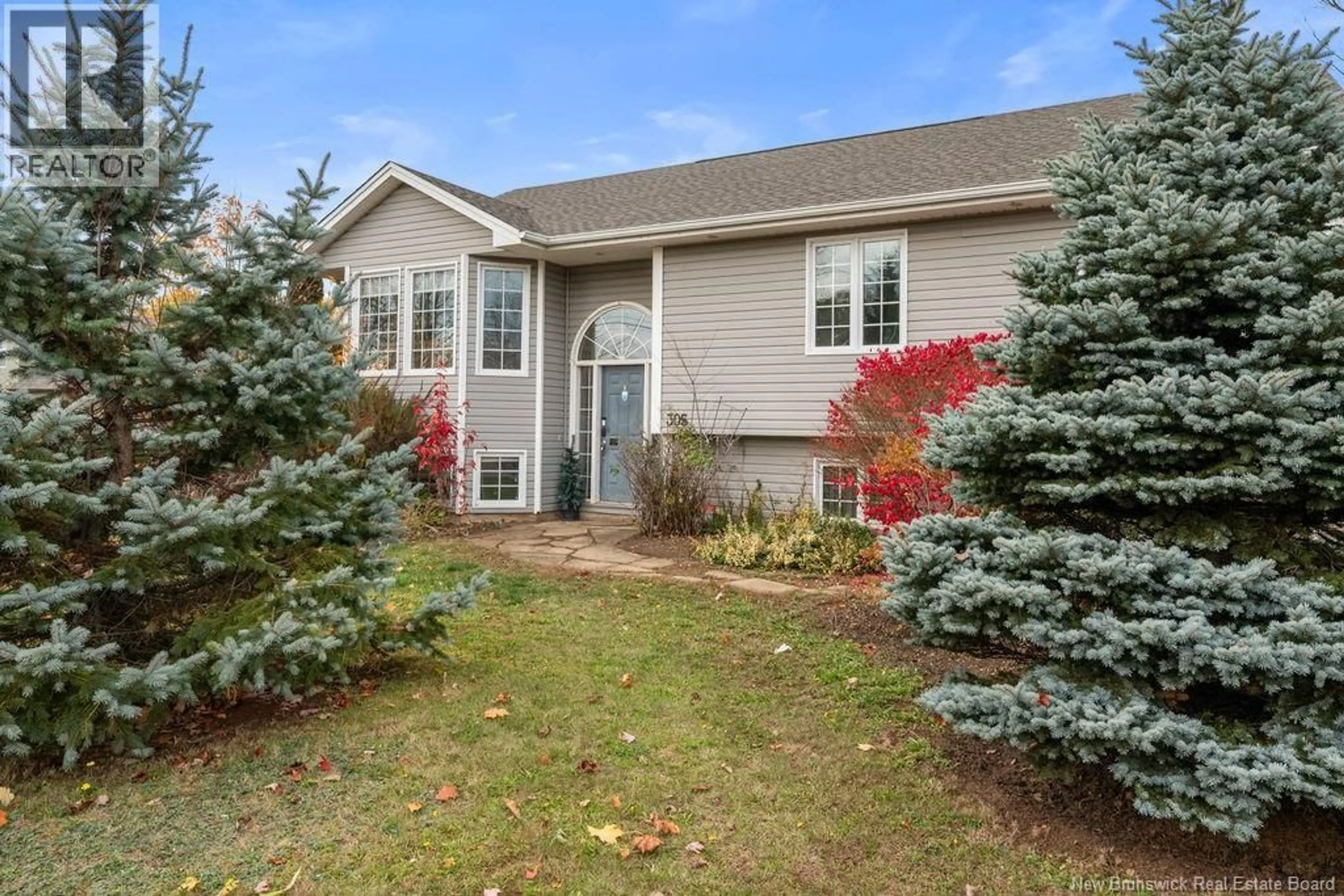 Home with vinyl exterior material, street for 305 MANON STREET, Dieppe New Brunswick E1A7W9