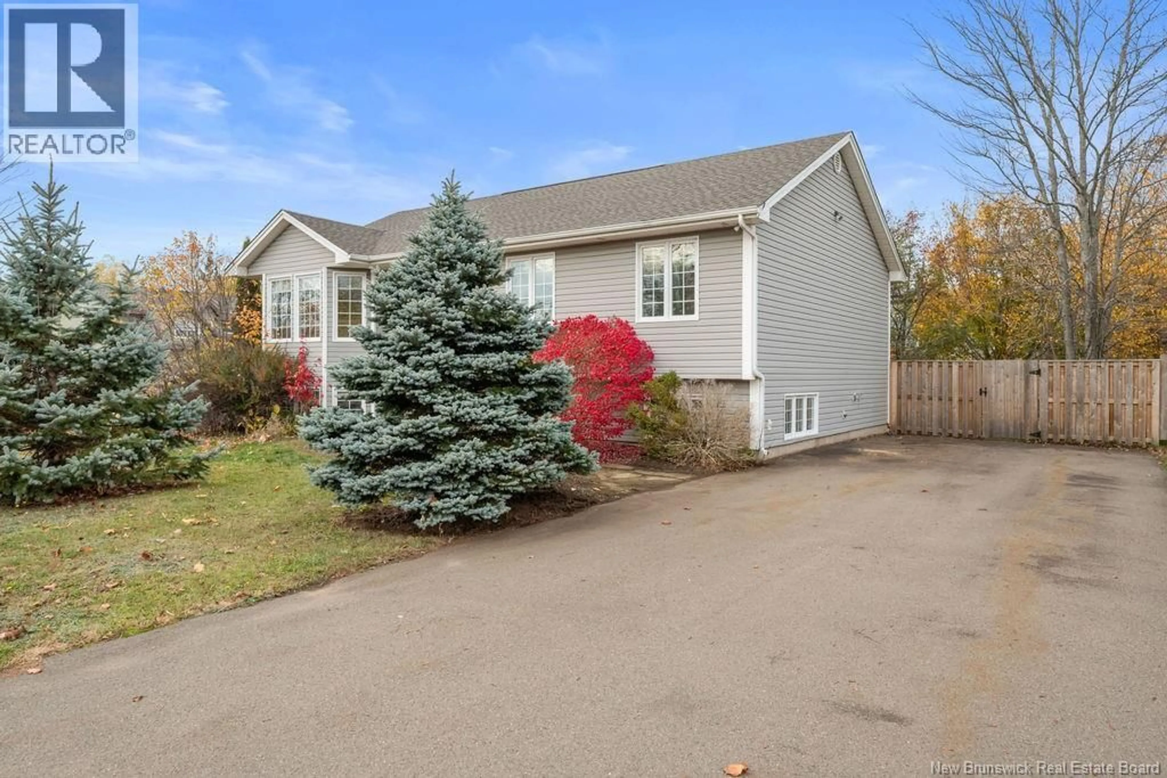 Home with vinyl exterior material, street for 305 MANON STREET, Dieppe New Brunswick E1A7W9