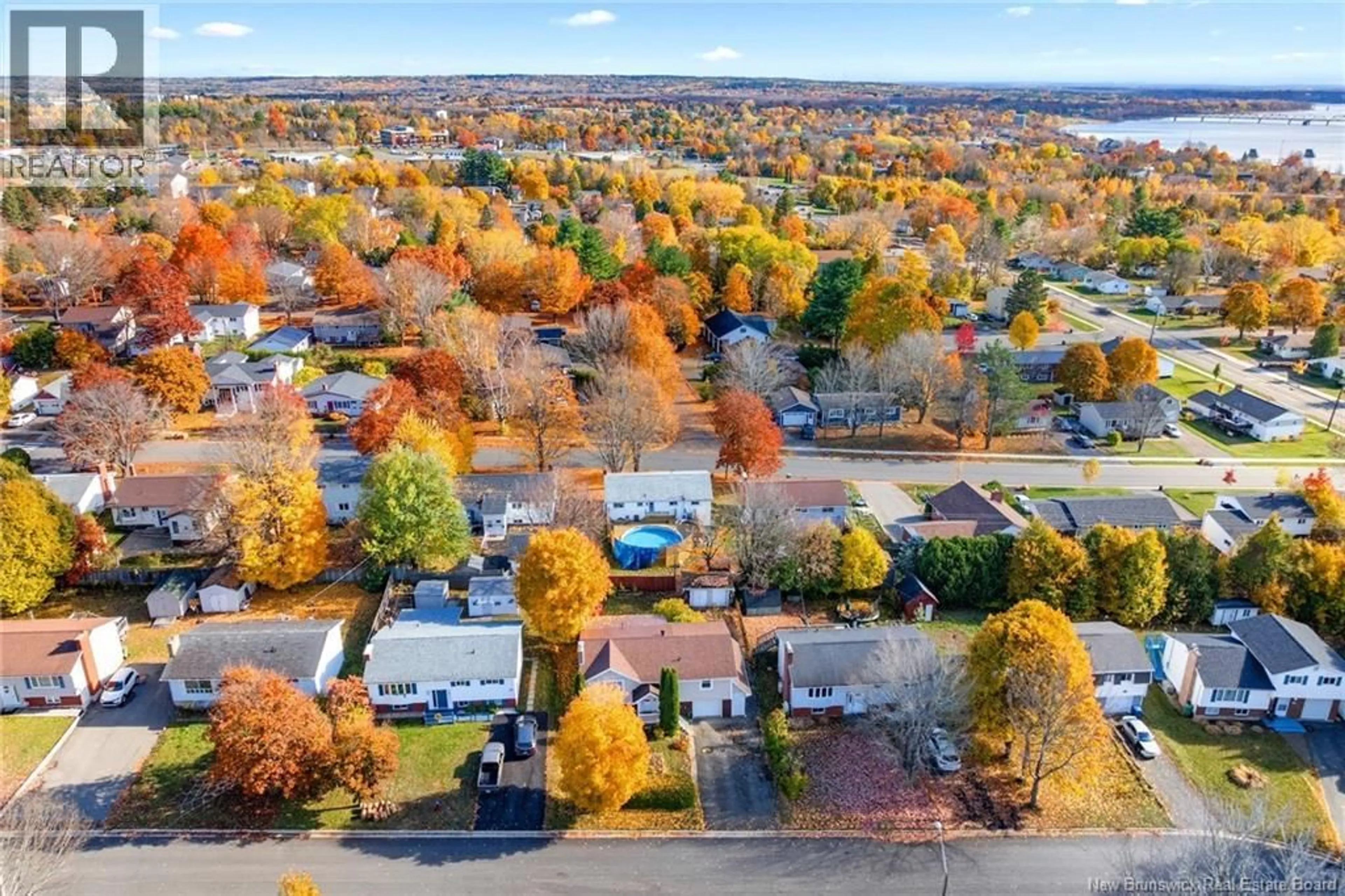A pic from outside/outdoor area/front of a property/back of a property/a pic from drone, street for 32 LINDEN CRESCENT, Fredericton New Brunswick E3A4Z9