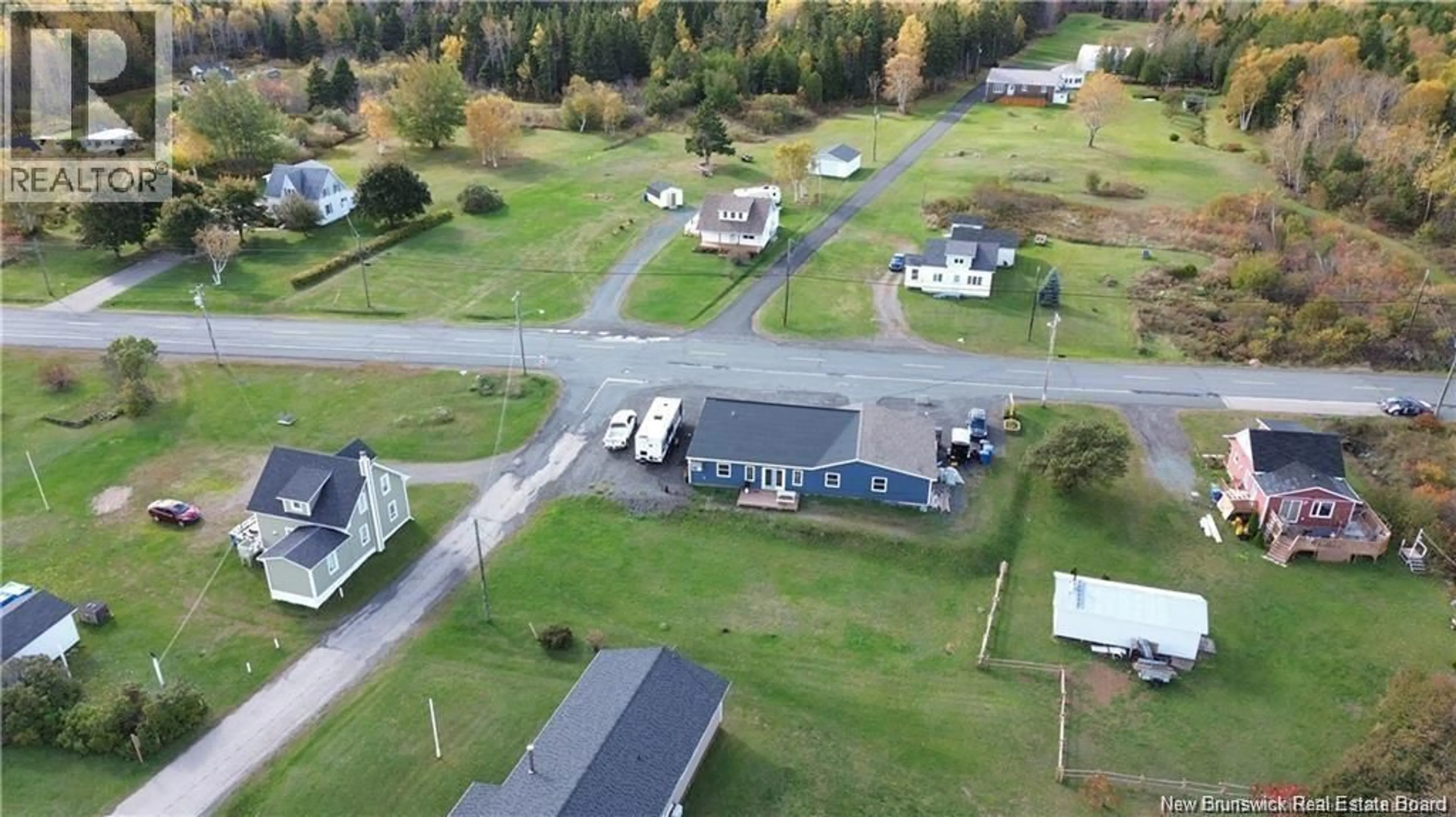 A pic from outside/outdoor area/front of a property/back of a property/a pic from drone, street for 563 RUE PRINCIPALE, Pointe-Verte New Brunswick E8J3A2