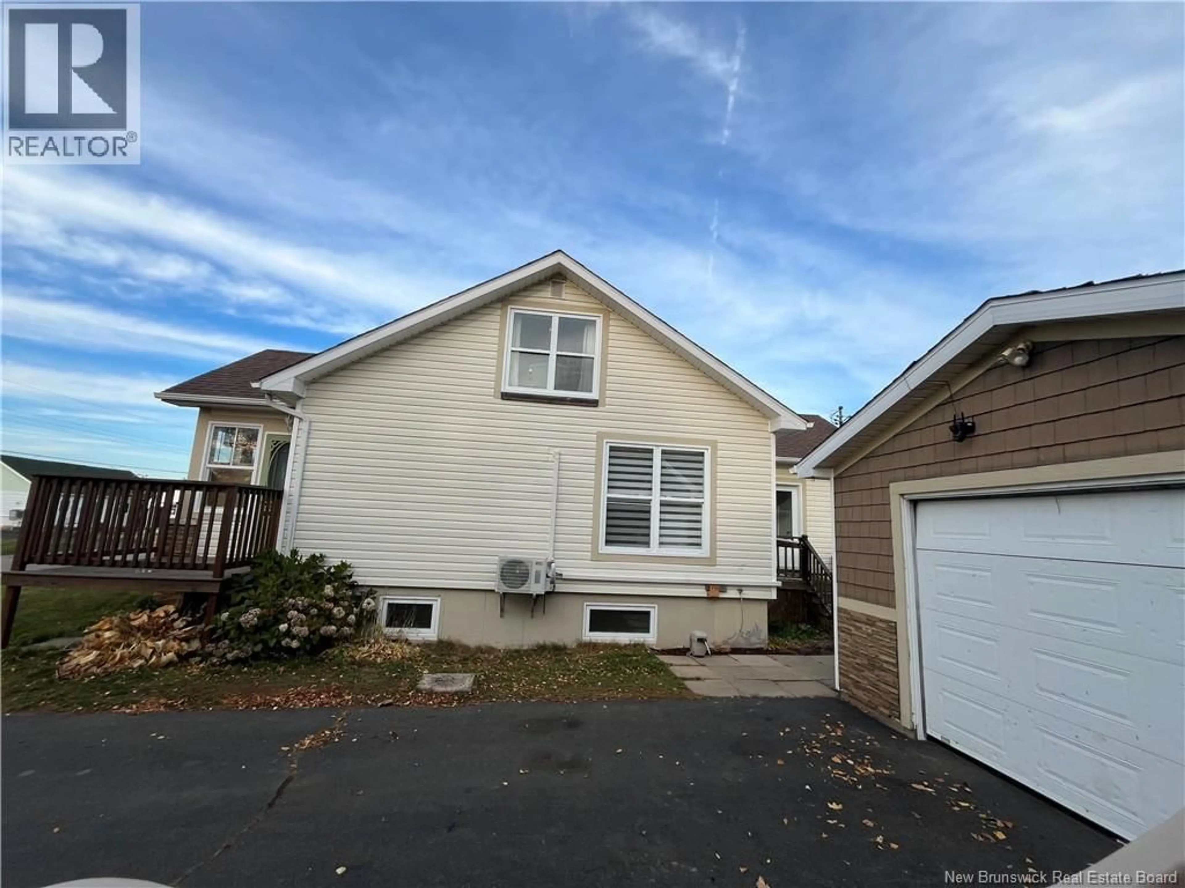 Home with vinyl exterior material, street for 144 DES SAULES, Shippagan New Brunswick E8S1K5
