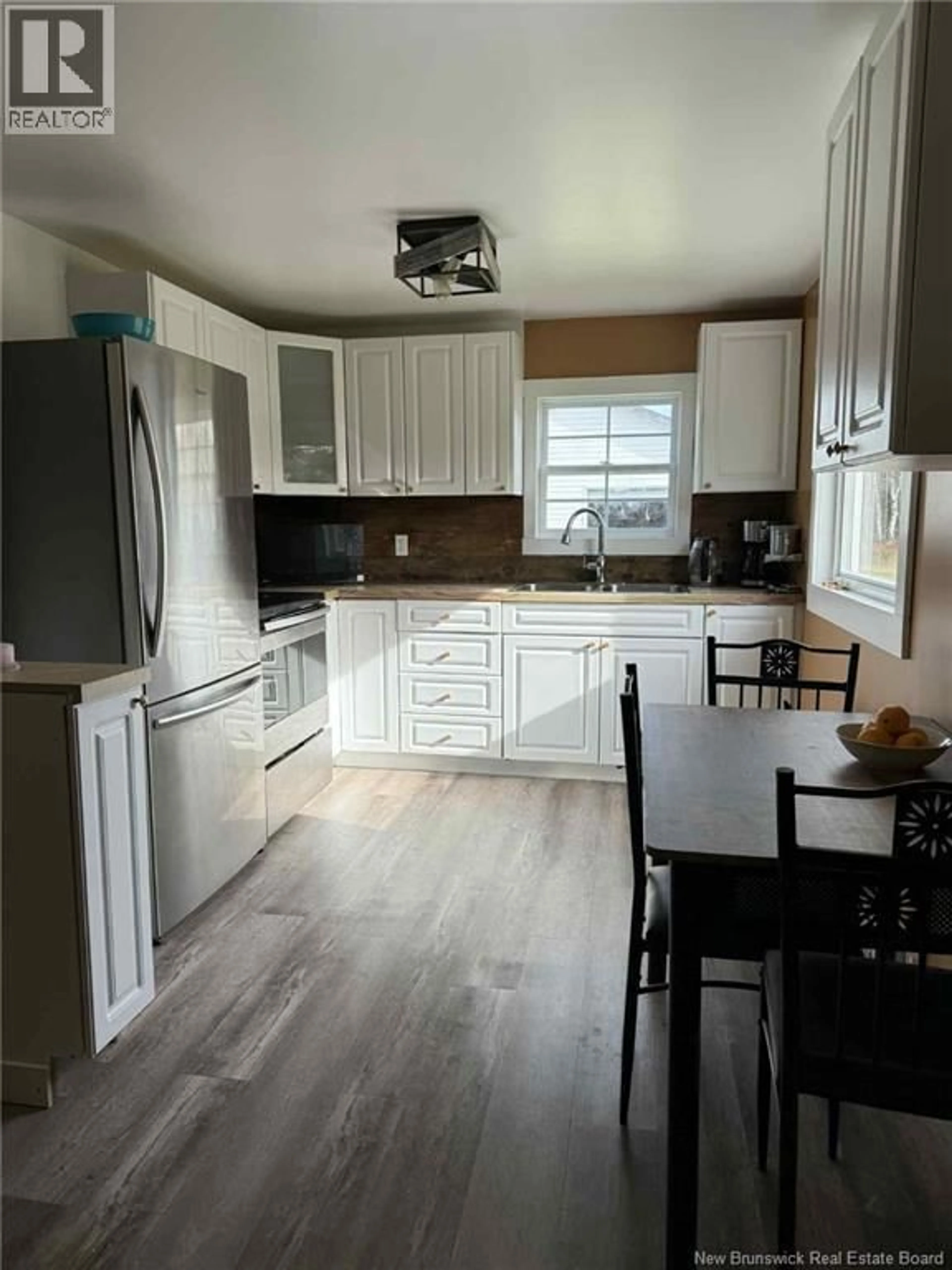 Open concept kitchen, wood/laminate floor for 400 BELLEFOND ROAD, Bellefond New Brunswick E1V4T6
