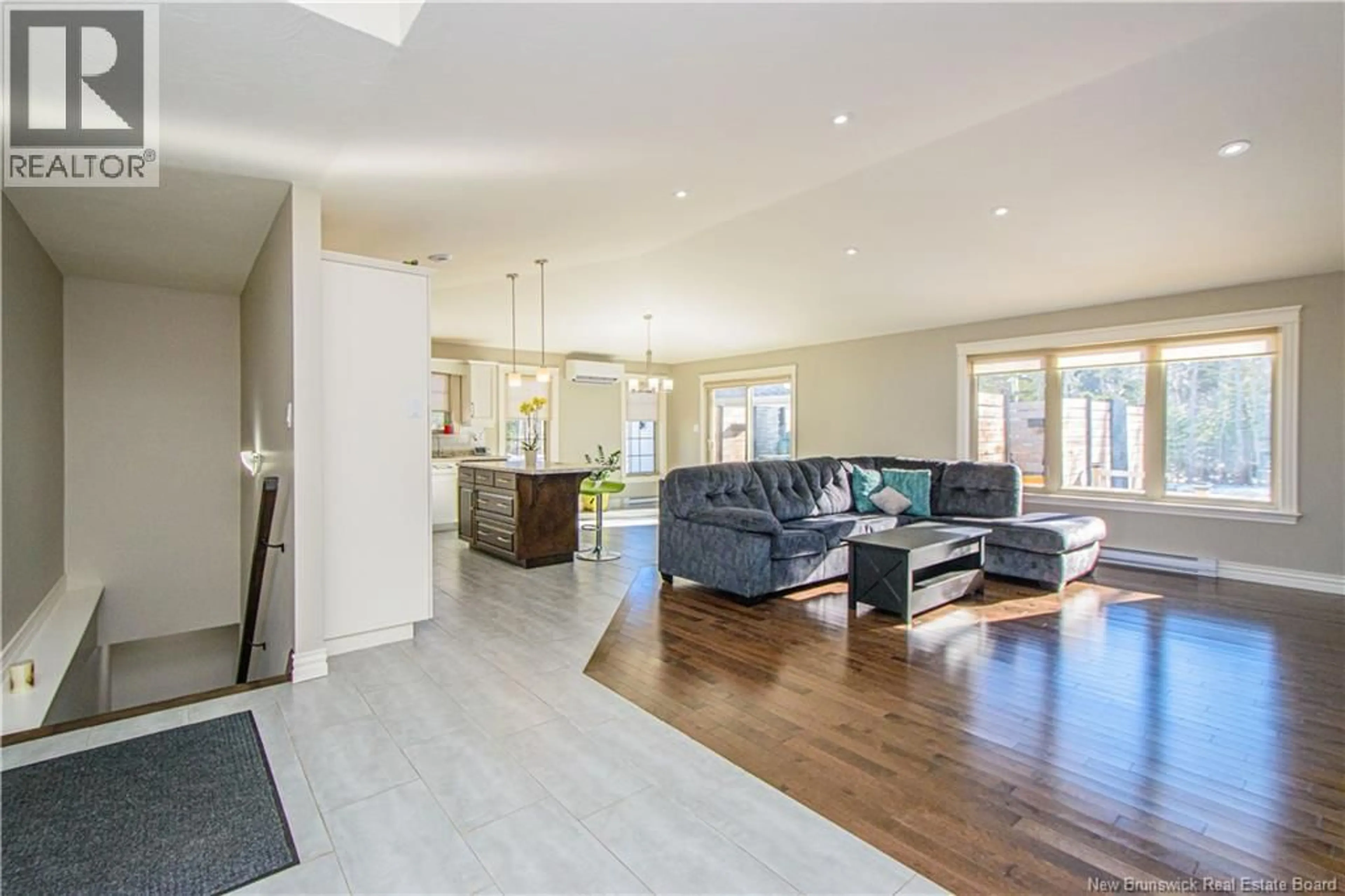 Living room with furniture, wood/laminate floor for 37 GUY STREET, Shediac New Brunswick E4P0L5