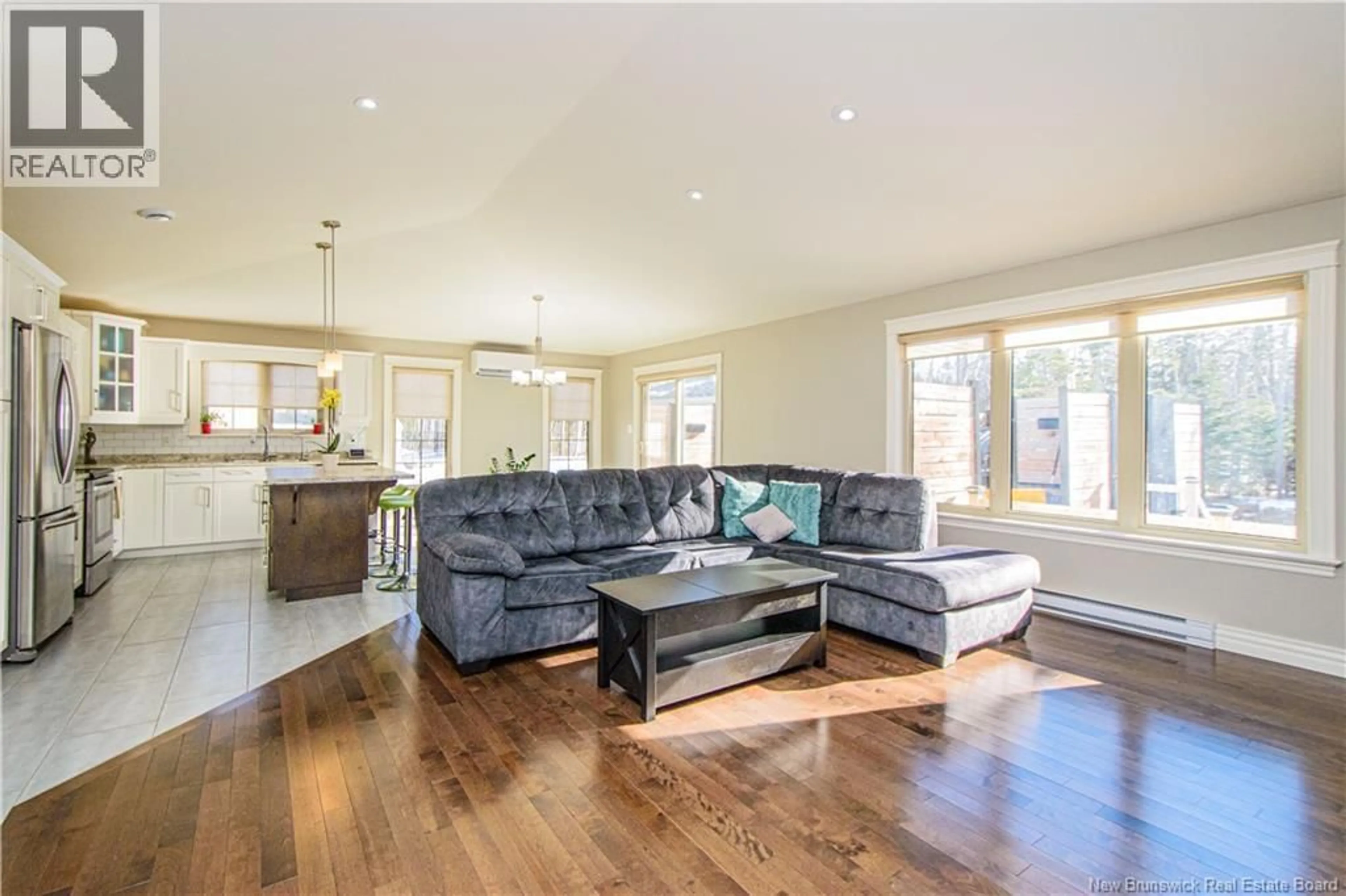 Living room with furniture, wood/laminate floor for 37 GUY STREET, Shediac New Brunswick E4P0L5