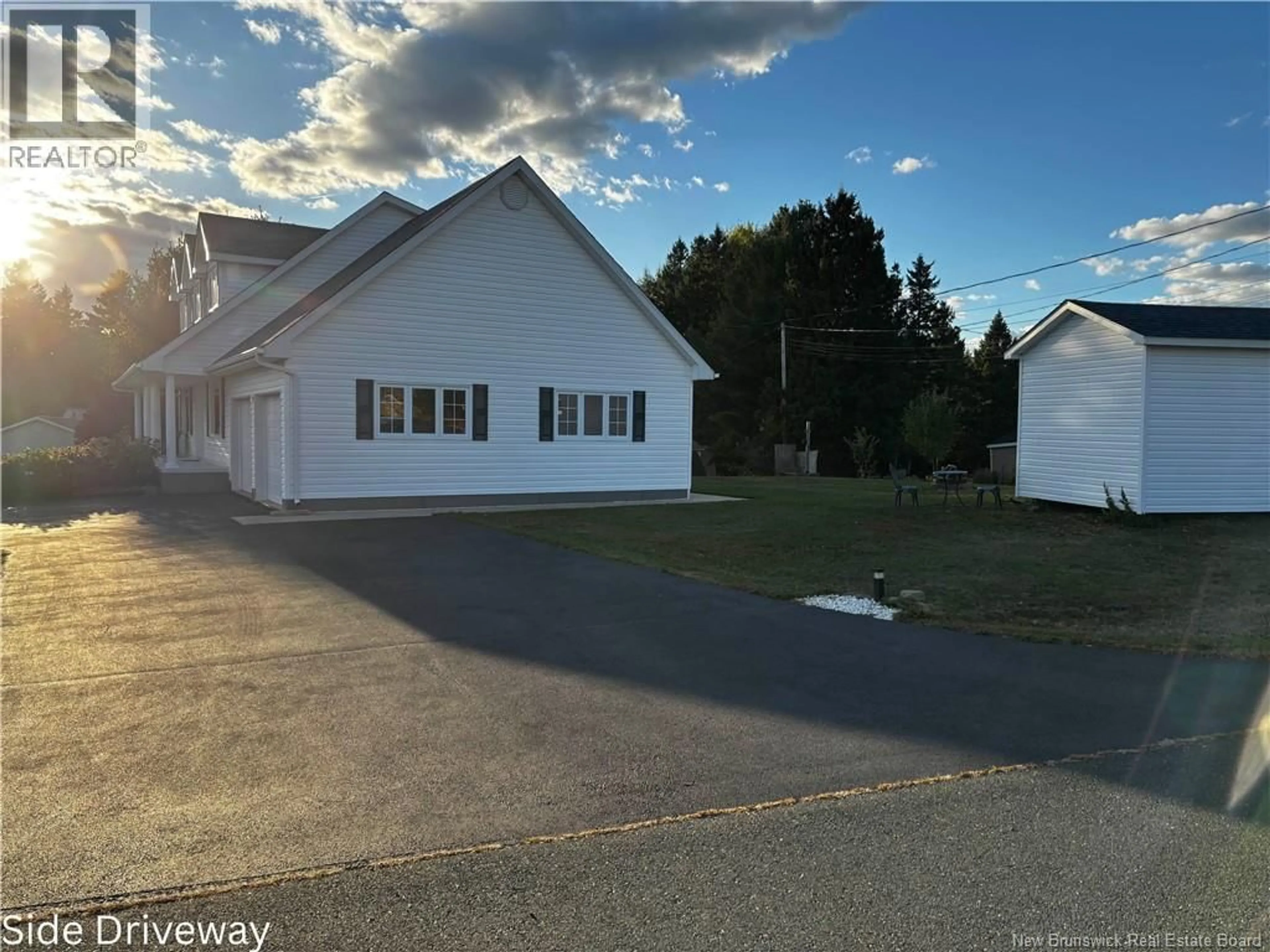 A pic from outside/outdoor area/front of a property/back of a property/a pic from drone, unknown for 9 ROSEBANK DRIVE, Miramichi New Brunswick E1V5M4