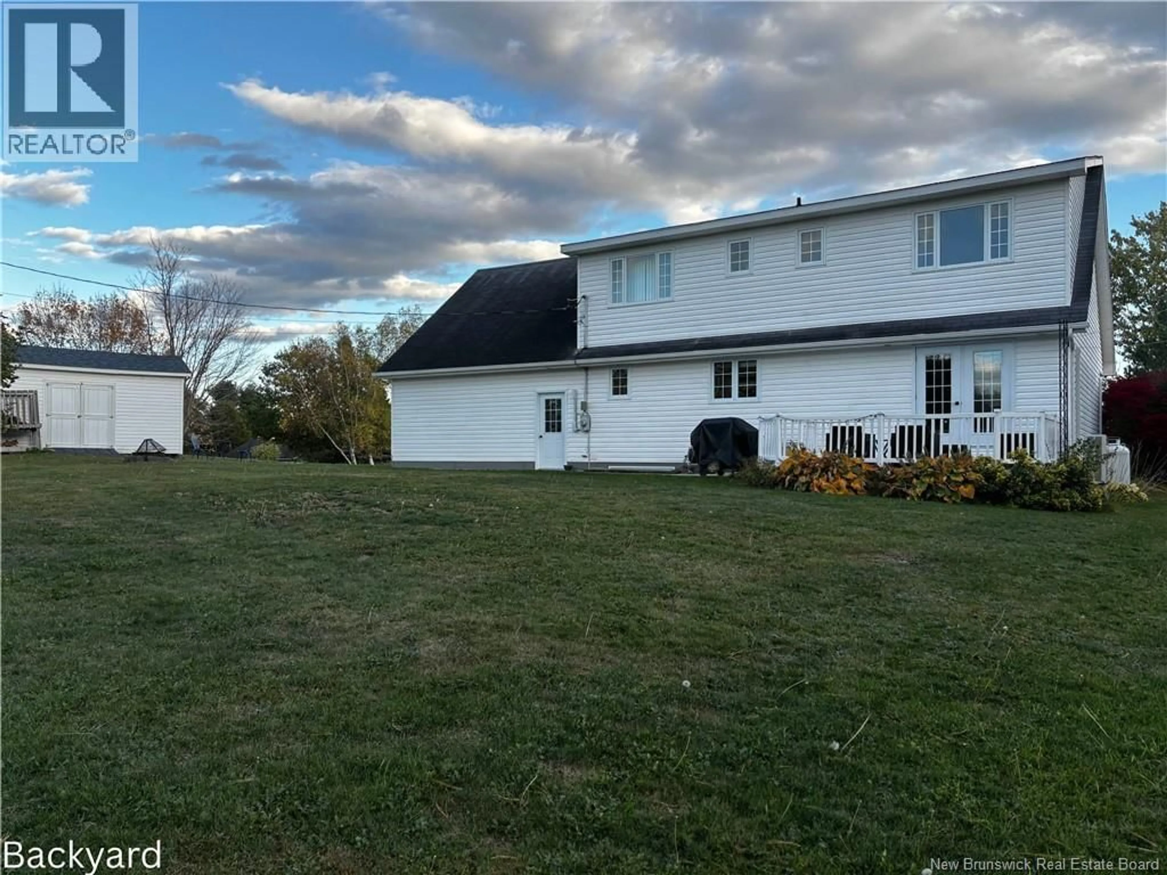A pic from outside/outdoor area/front of a property/back of a property/a pic from drone, water/lake/river/ocean view for 9 ROSEBANK DRIVE, Miramichi New Brunswick E1V5M4