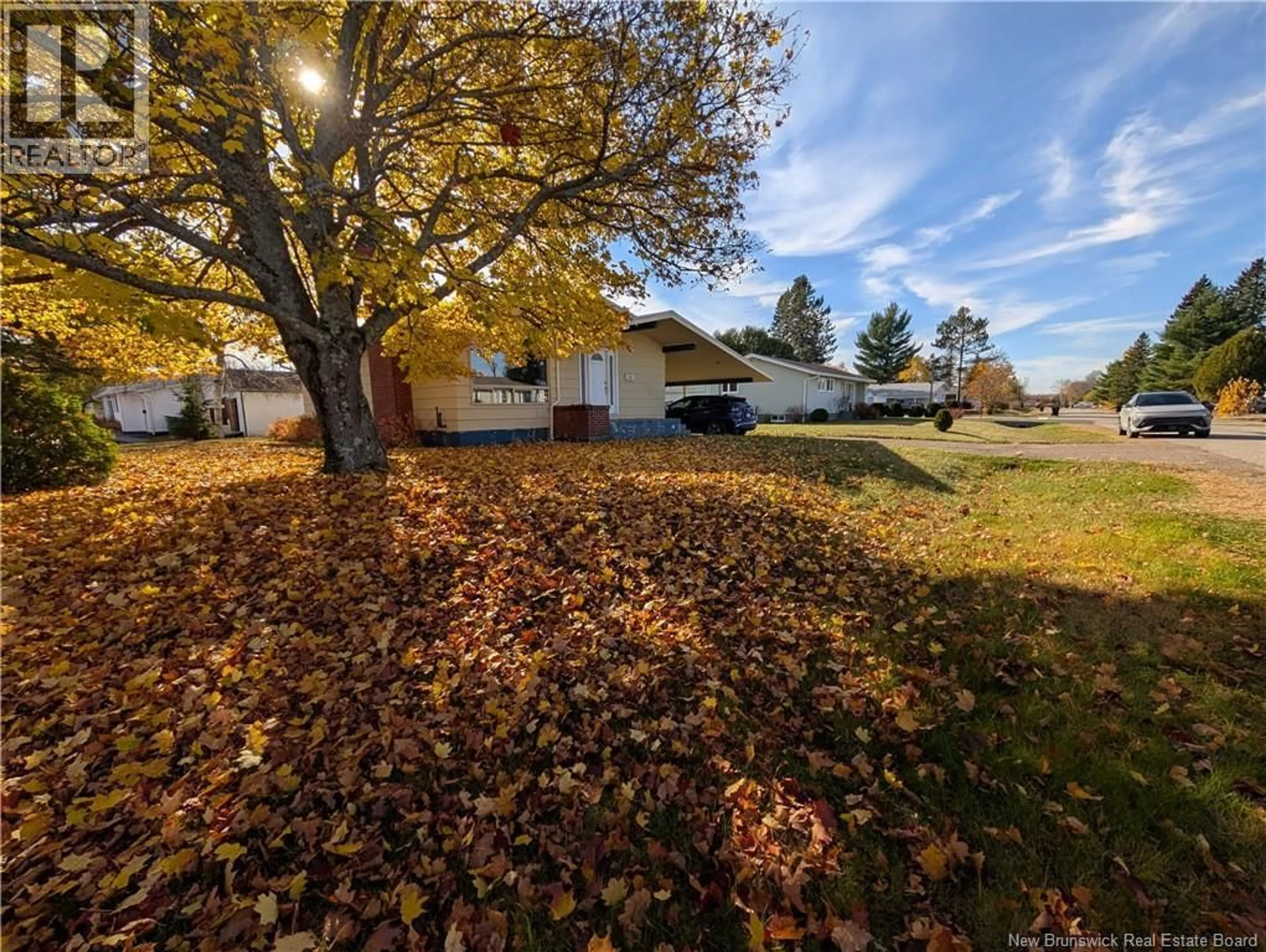 A pic from outside/outdoor area/front of a property/back of a property/a pic from drone, street for 1105 SMITH, Bathurst New Brunswick E2A3V3