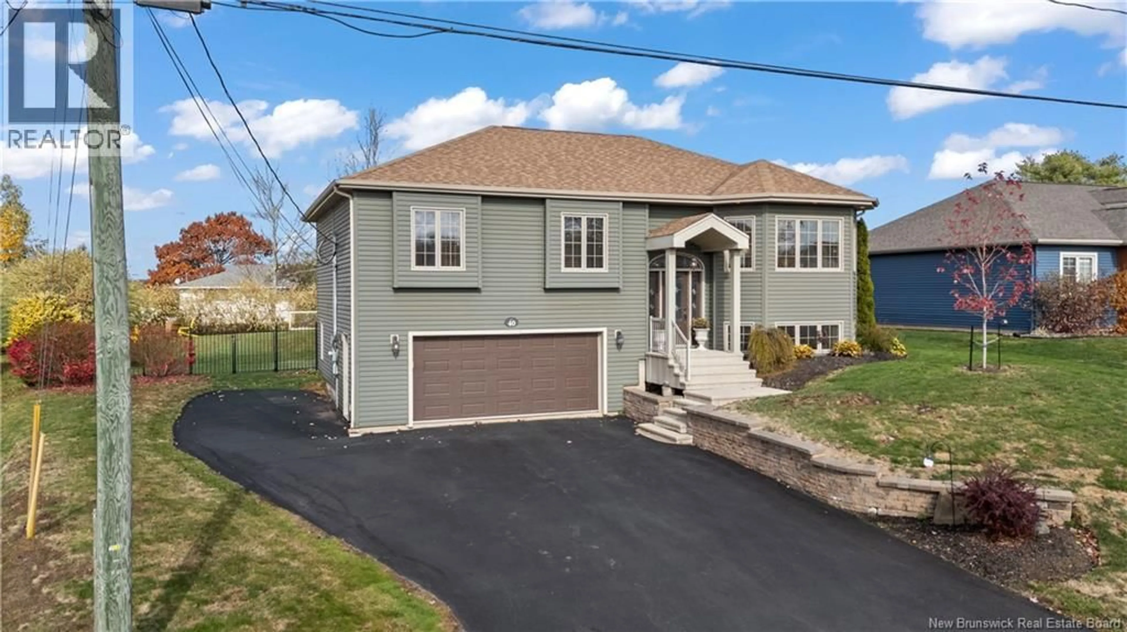 Home with vinyl exterior material, street for 40 EUGENE COURT, Dieppe New Brunswick E1A0P2