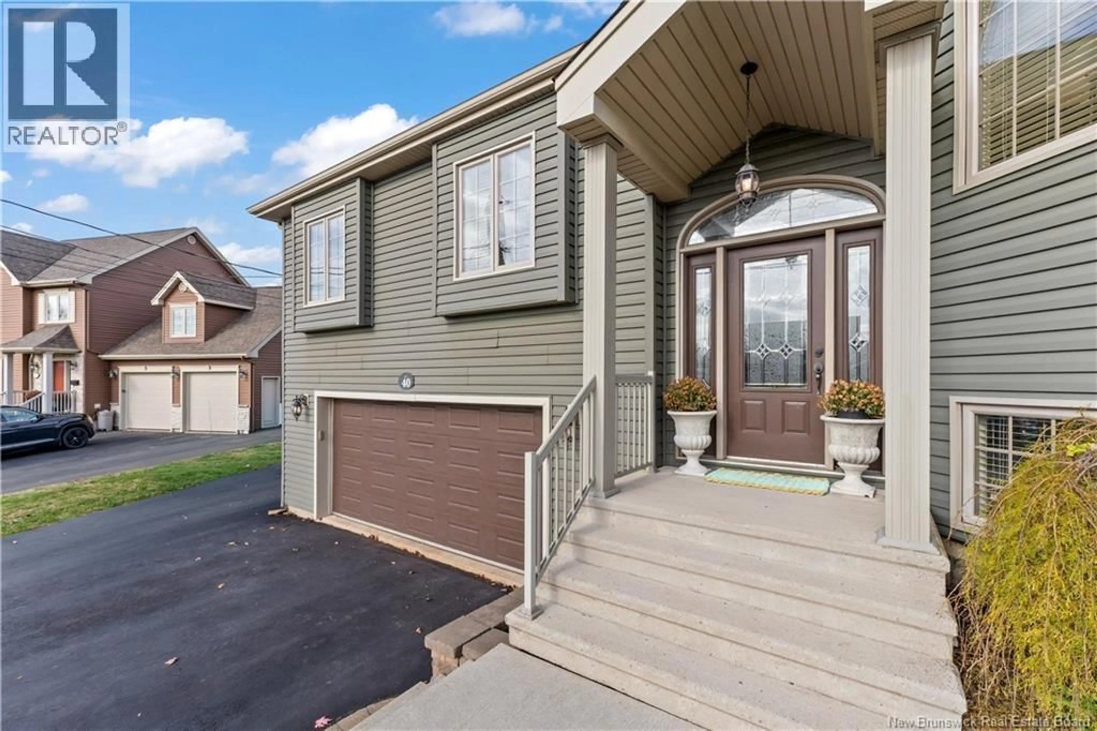 Home with vinyl exterior material, street for 40 EUGENE COURT, Dieppe New Brunswick E1A0P2