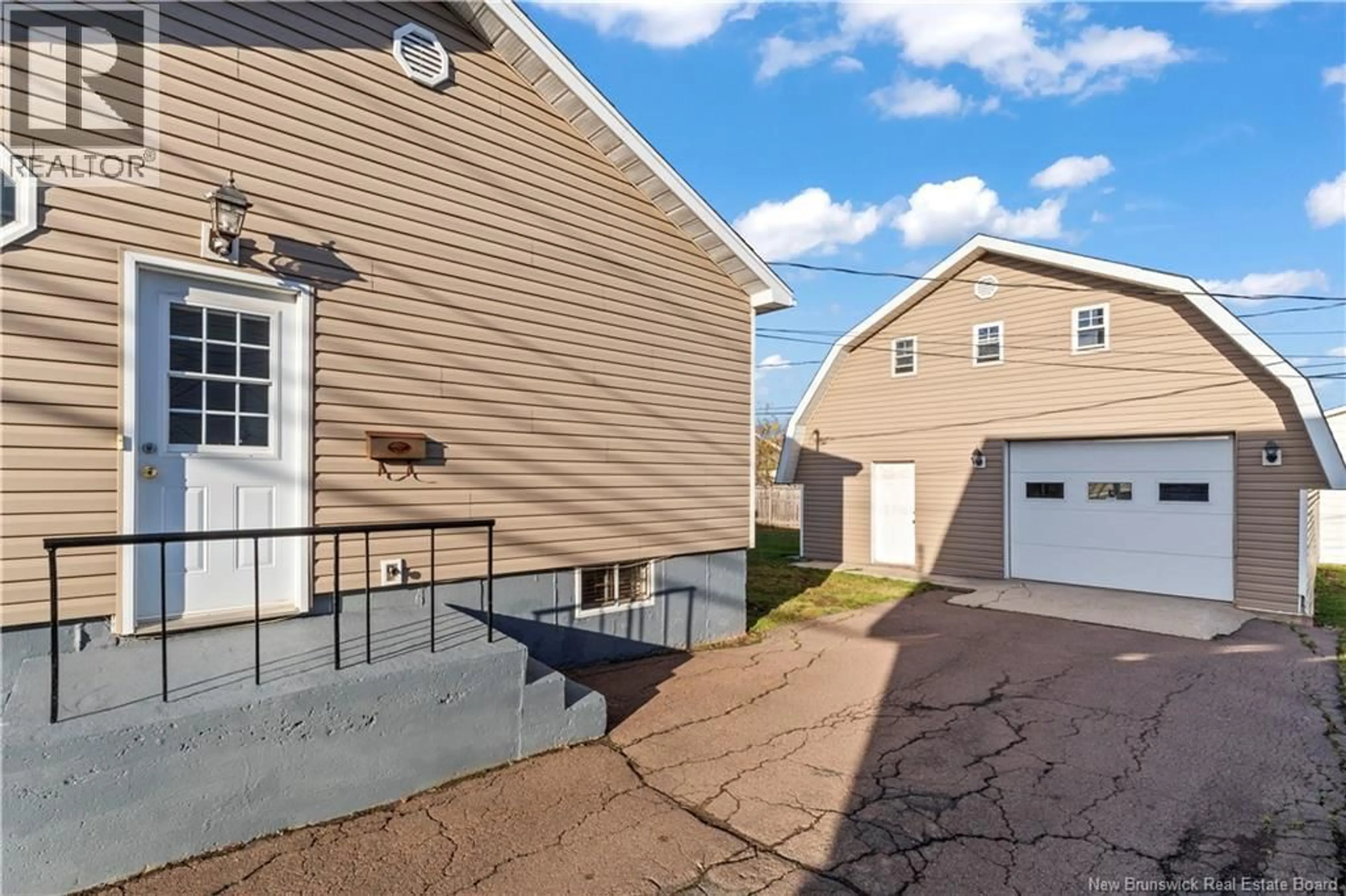 Home with vinyl exterior material, street for 61 MAPLETON, Moncton New Brunswick E1C7W6