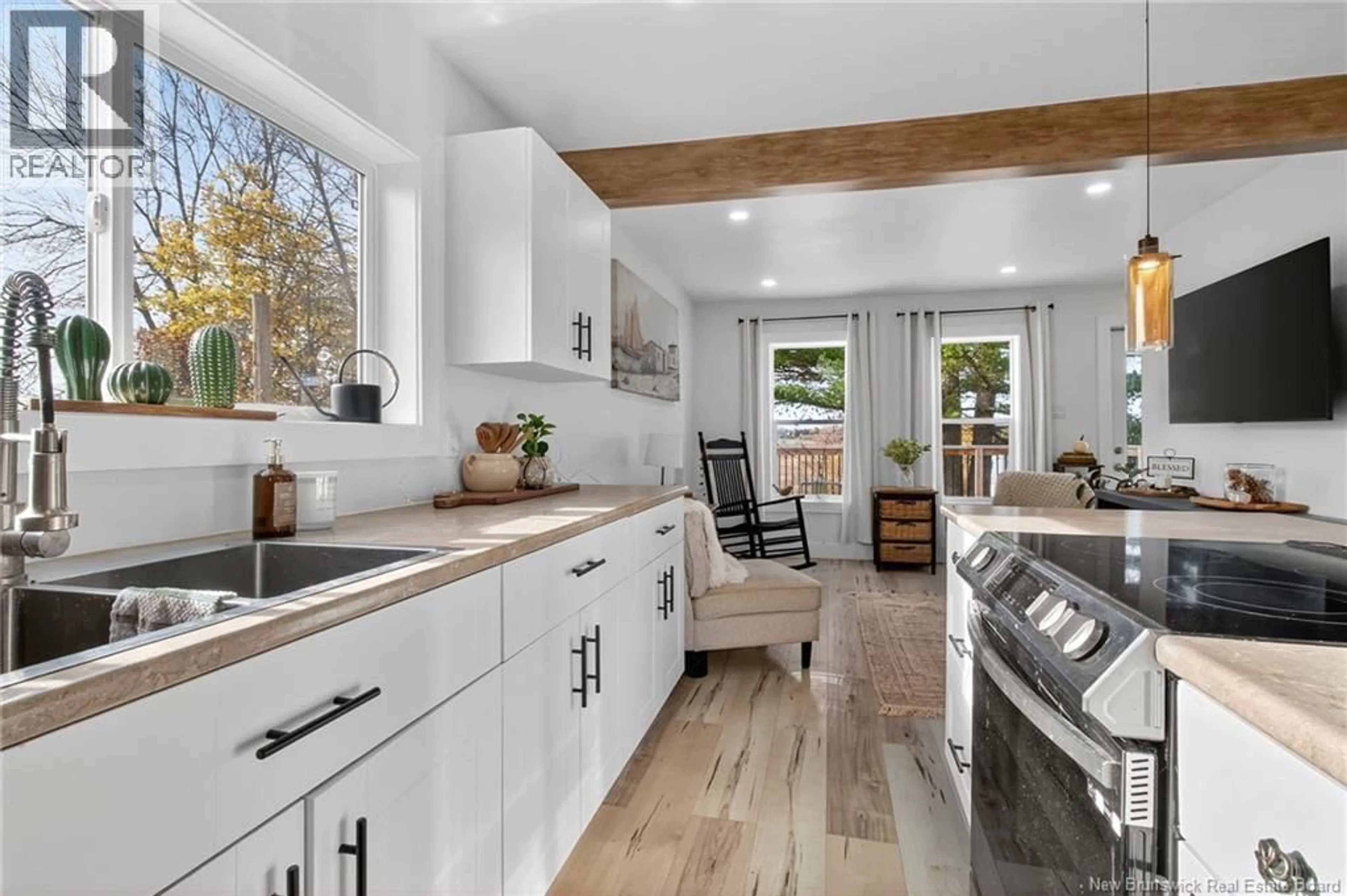 Open concept kitchen, ceramic/tile floor for 11 ALPHEE STREET, Memramcook New Brunswick E4K1C2