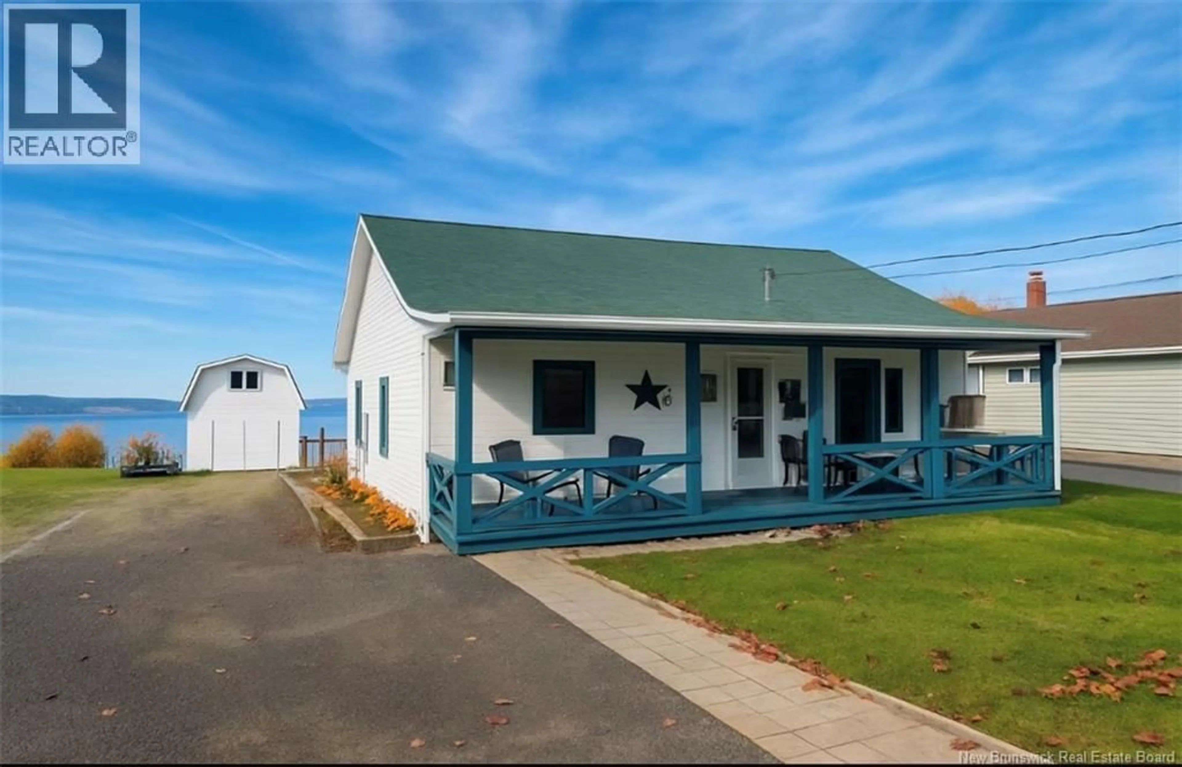 A pic from outside/outdoor area/front of a property/back of a property/a pic from drone, building for 611 VICTORIA STREET, Dalhousie New Brunswick E8C2V6