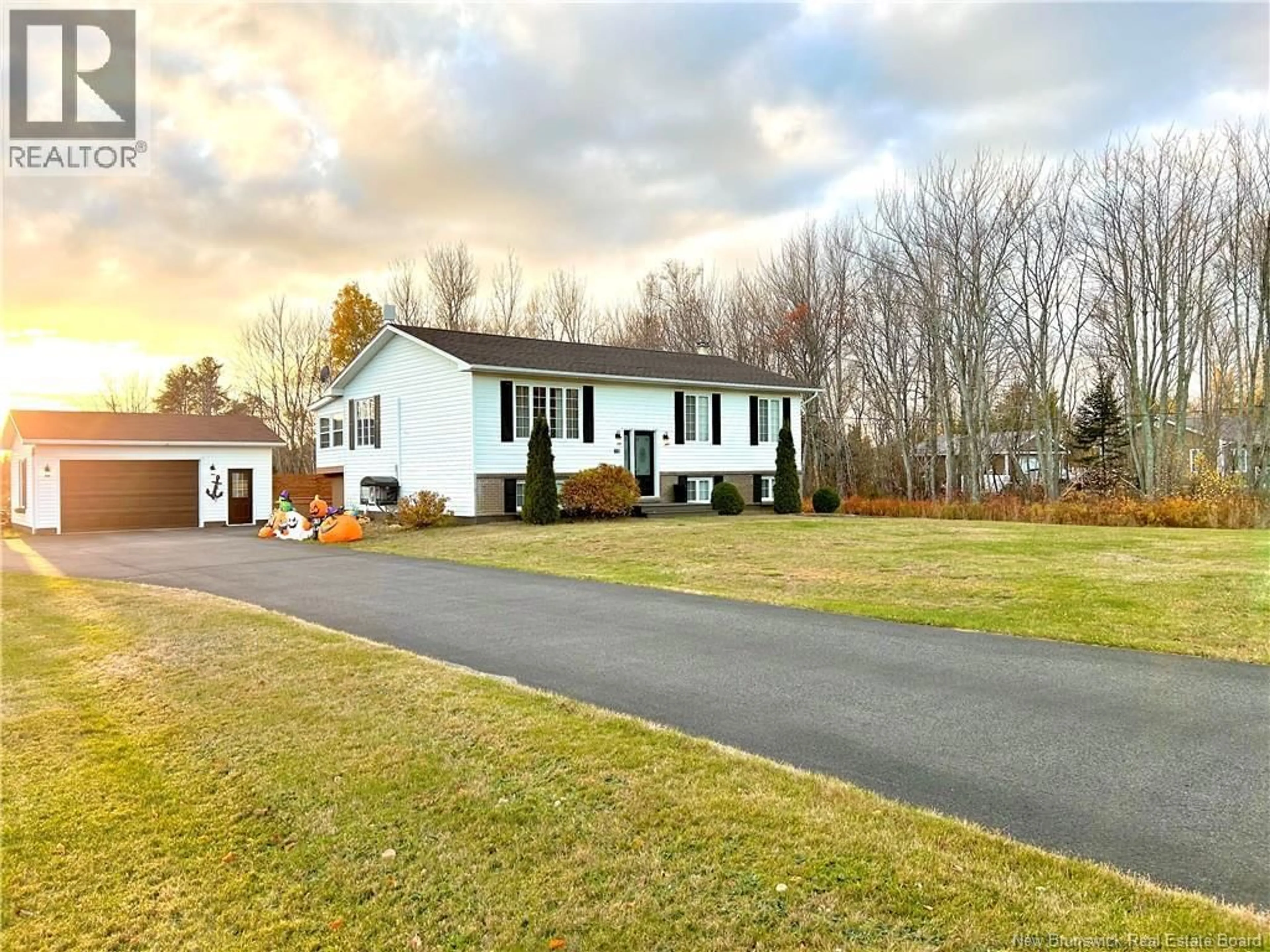 Home with vinyl exterior material, street for 15 CH. MANUEL, Baie-Sainte-Anne New Brunswick E9A1G3