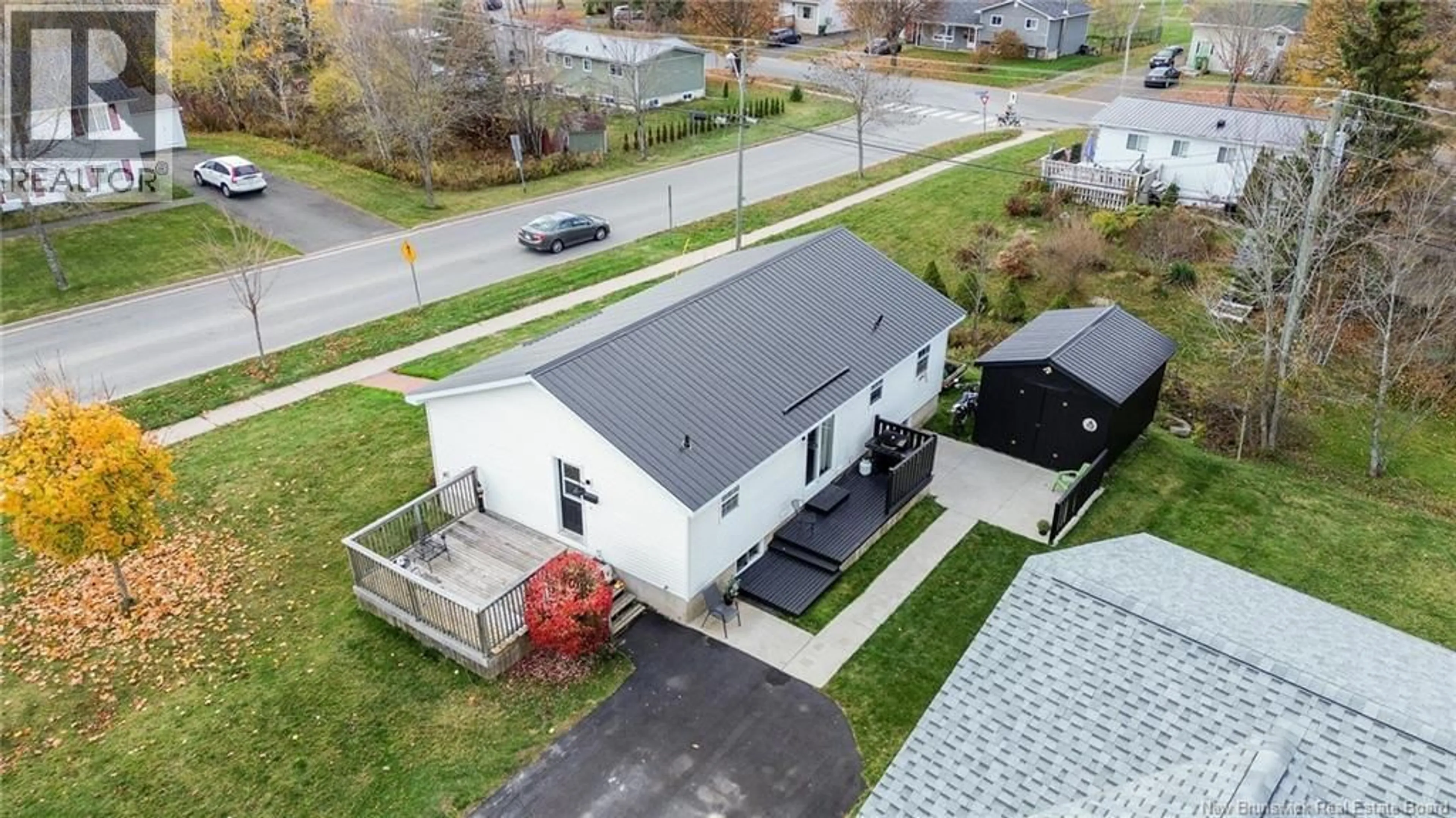 A pic from outside/outdoor area/front of a property/back of a property/a pic from drone, street for 235 MCNIGHT STREET, Fredericton New Brunswick E3A9R6