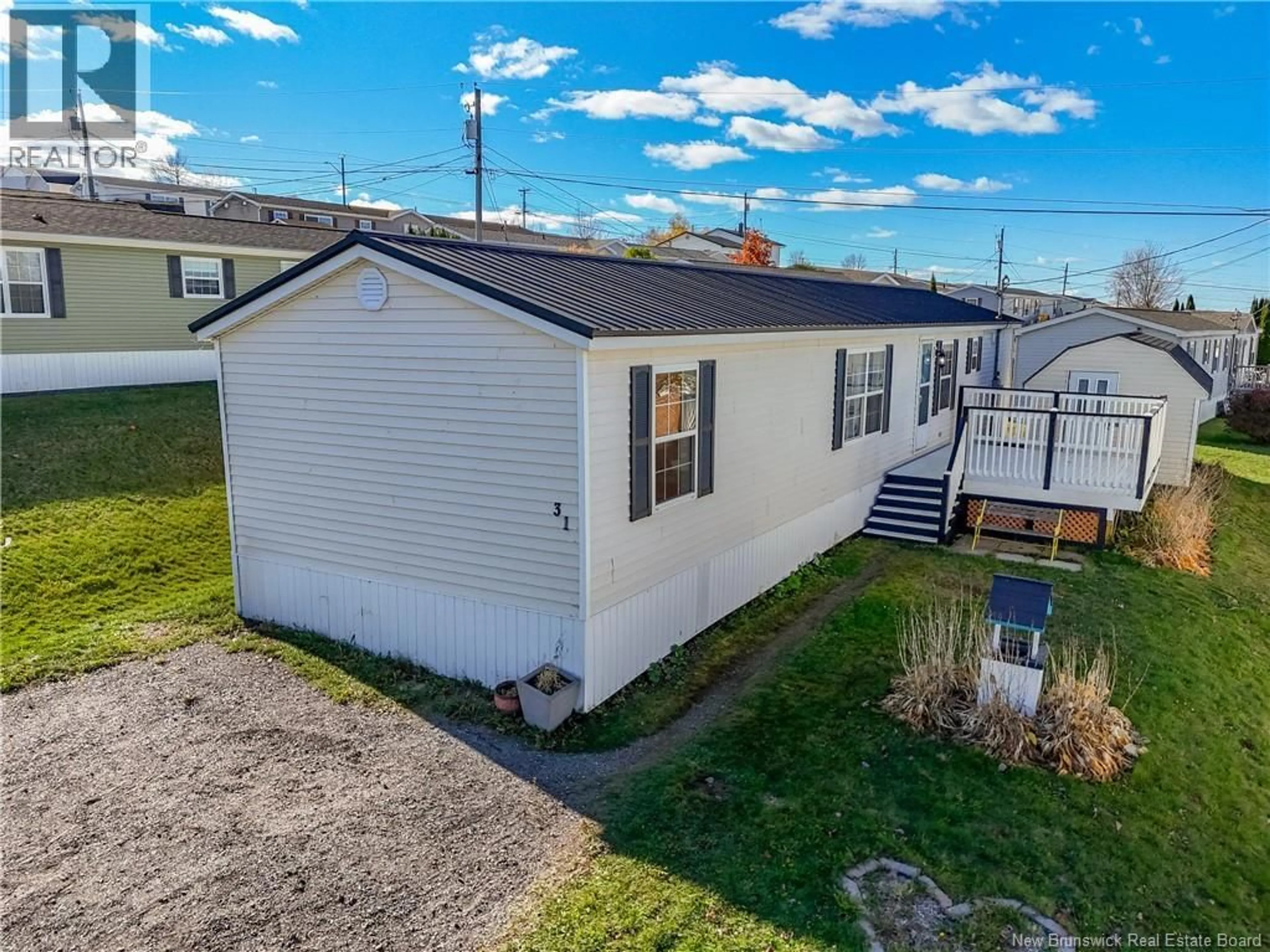 A pic from outside/outdoor area/front of a property/back of a property/a pic from drone, unknown for 31 SHERRY'S LANE, Fredericton New Brunswick E3C8H1