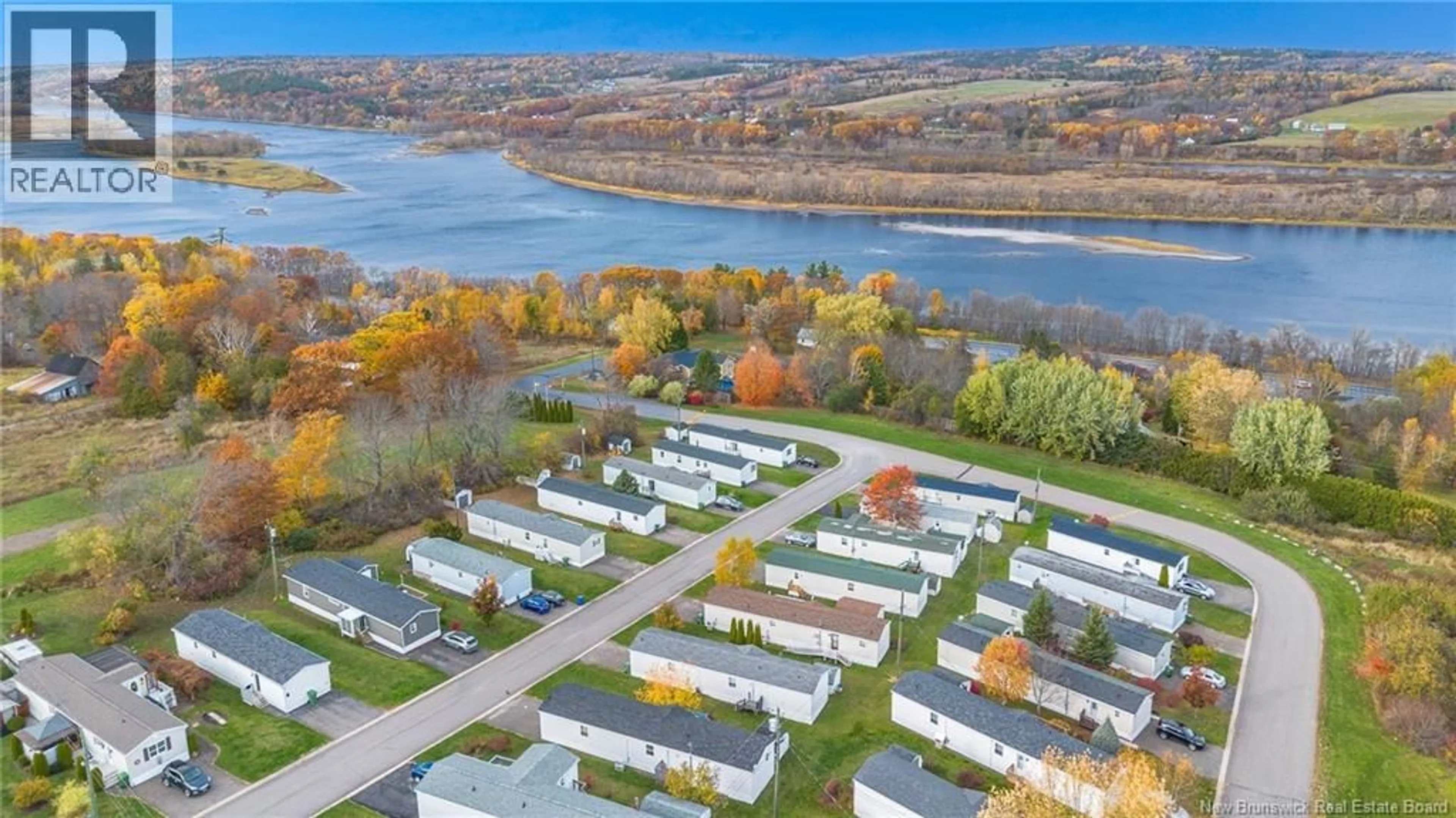 A pic from outside/outdoor area/front of a property/back of a property/a pic from drone, water/lake/river/ocean view for 16 TODD STREET, Fredericton New Brunswick E3C2M9