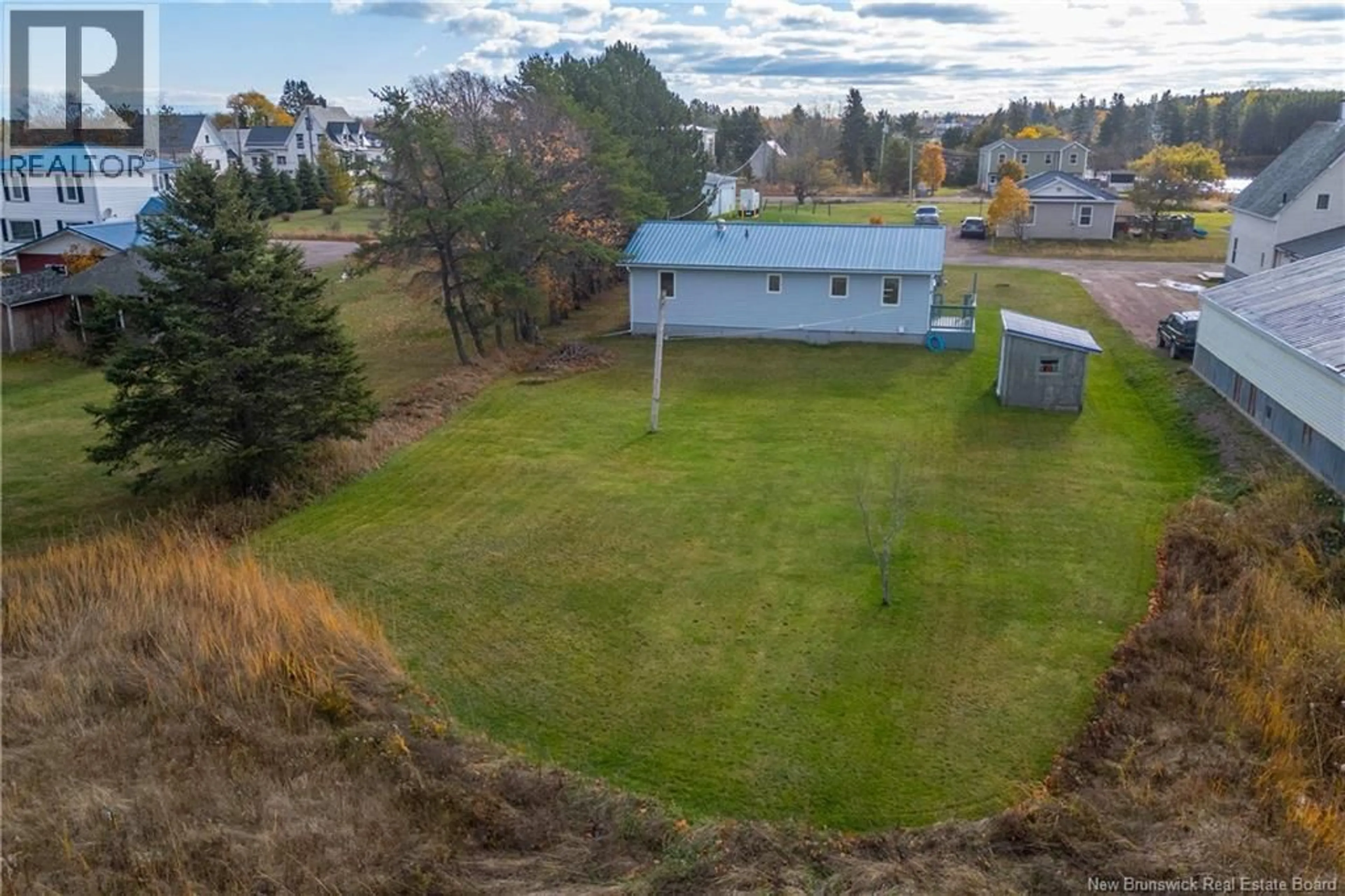 A pic from outside/outdoor area/front of a property/back of a property/a pic from drone, water/lake/river/ocean view for 3 BIRCH STREET, Port Elgin New Brunswick E4M2B9