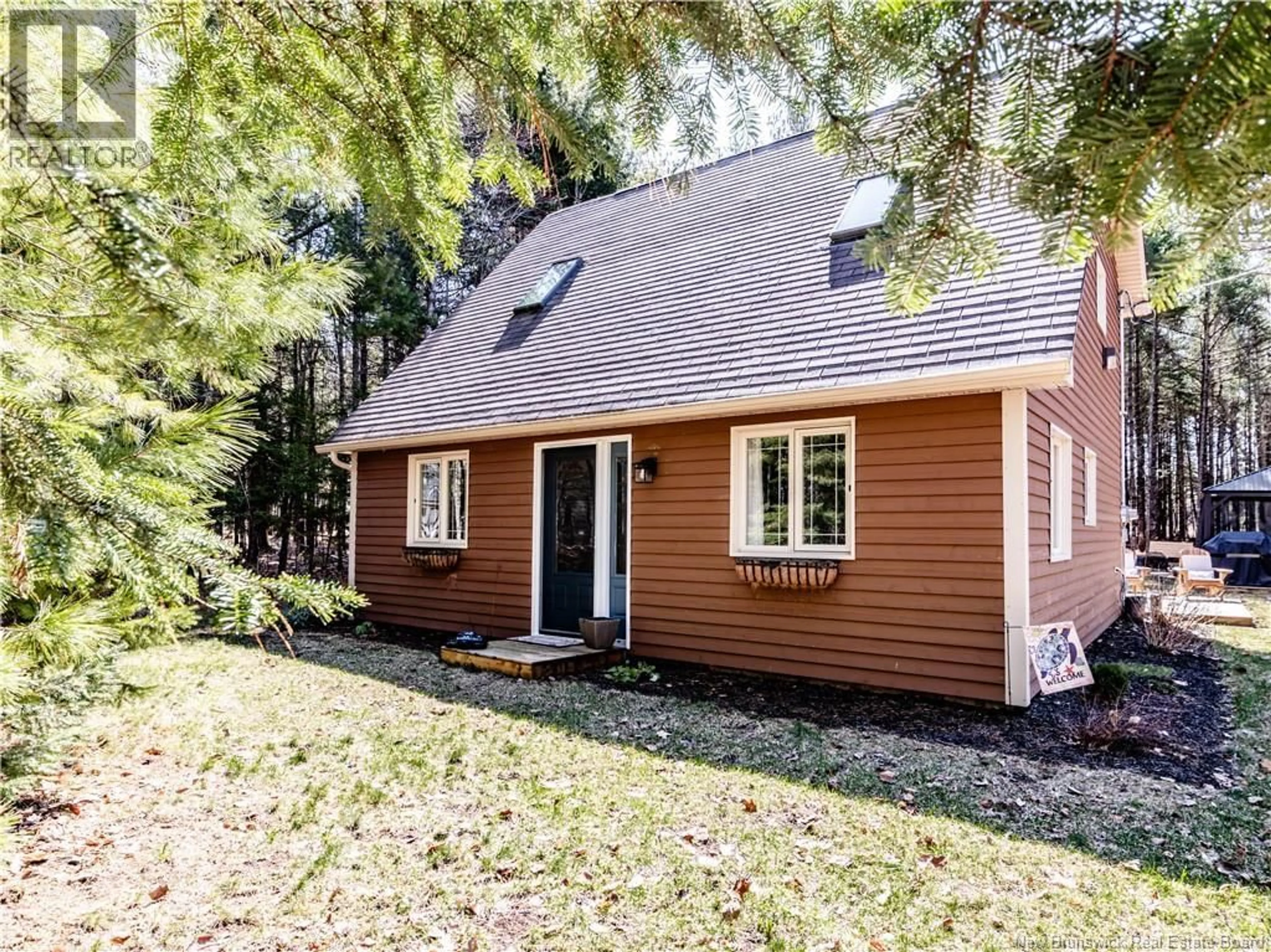 Home with vinyl exterior material, street for 129 DO-RAY CHALETS ROAD, Childs Creek New Brunswick E4W2N4