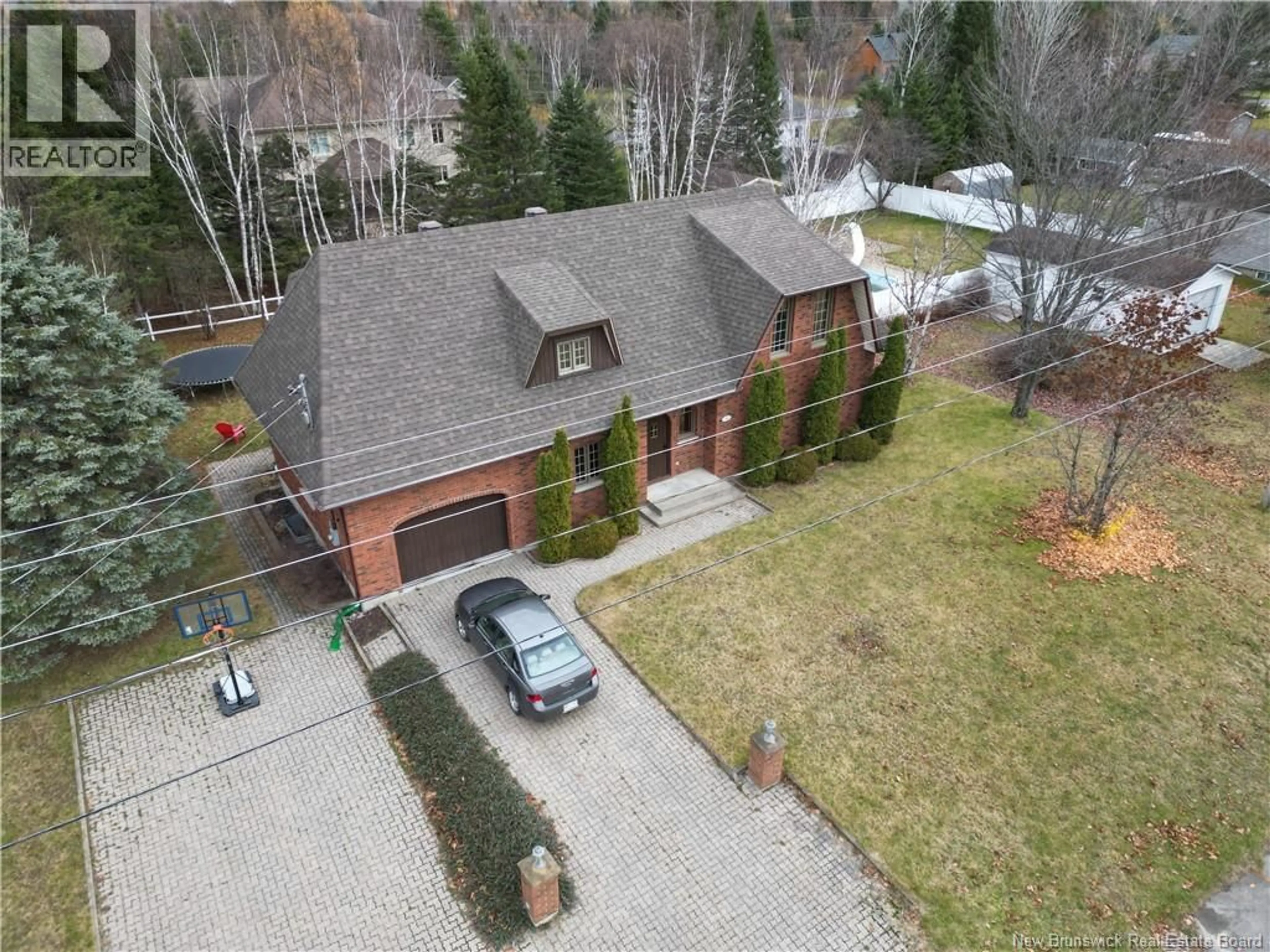 A pic from outside/outdoor area/front of a property/back of a property/a pic from drone, street for 24 PAQUIN STREET, Saint-Jacques New Brunswick E7B1V4