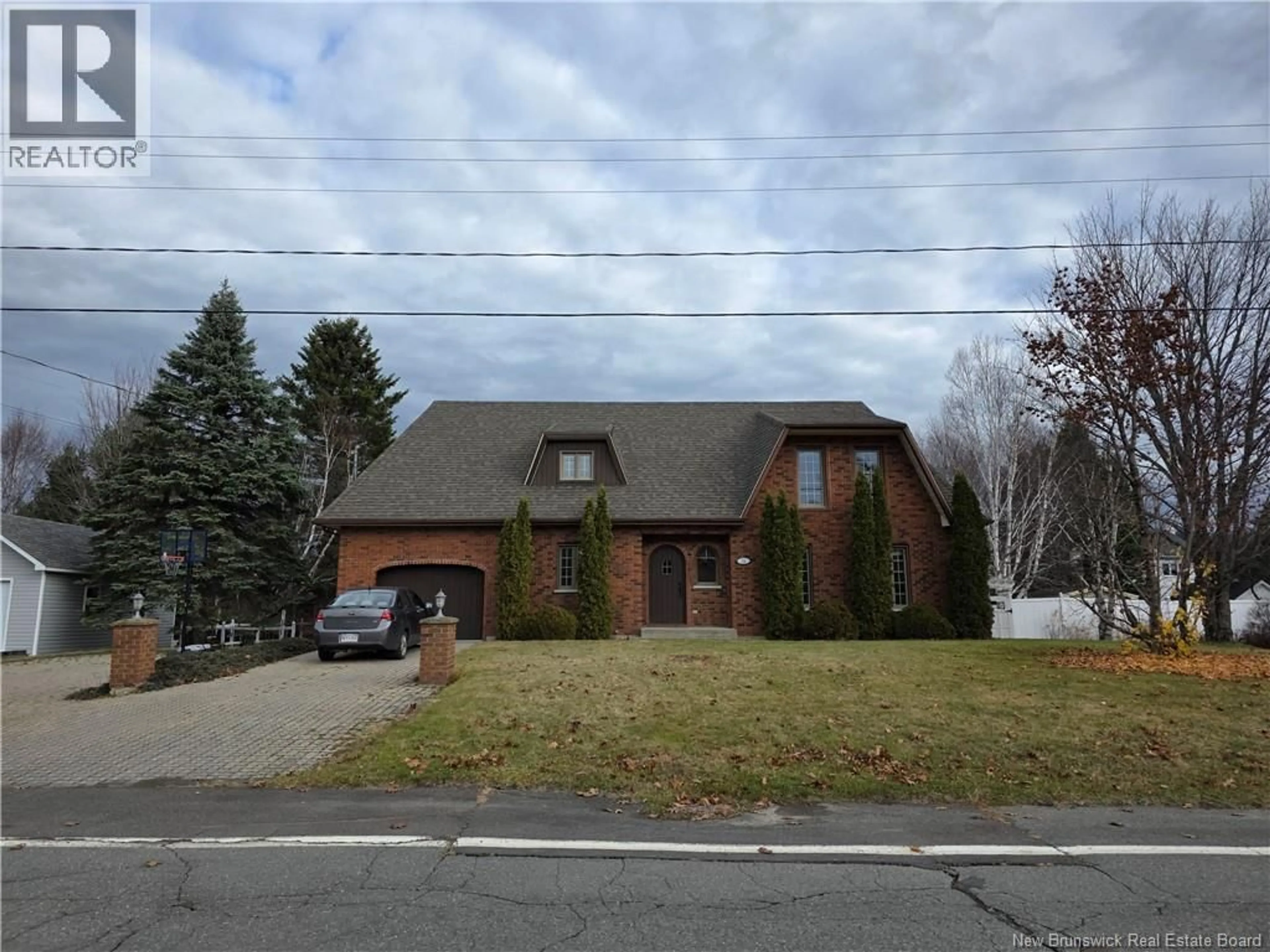 Home with brick exterior material, street for 24 PAQUIN STREET, Saint-Jacques New Brunswick E7B1V4
