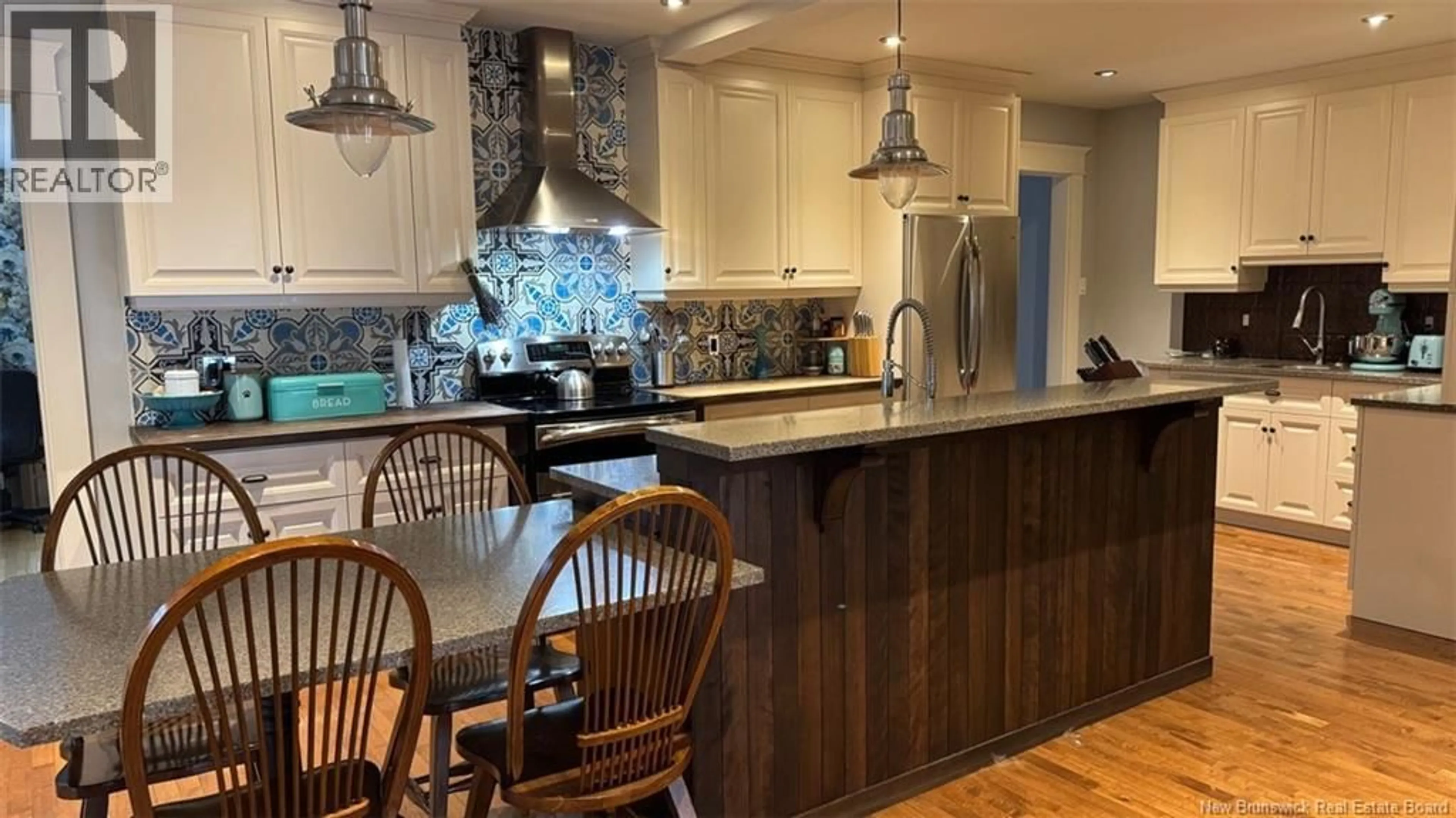 Open concept kitchen, wood/laminate floor for 77 FRASER, Edmundston New Brunswick E3V2B6