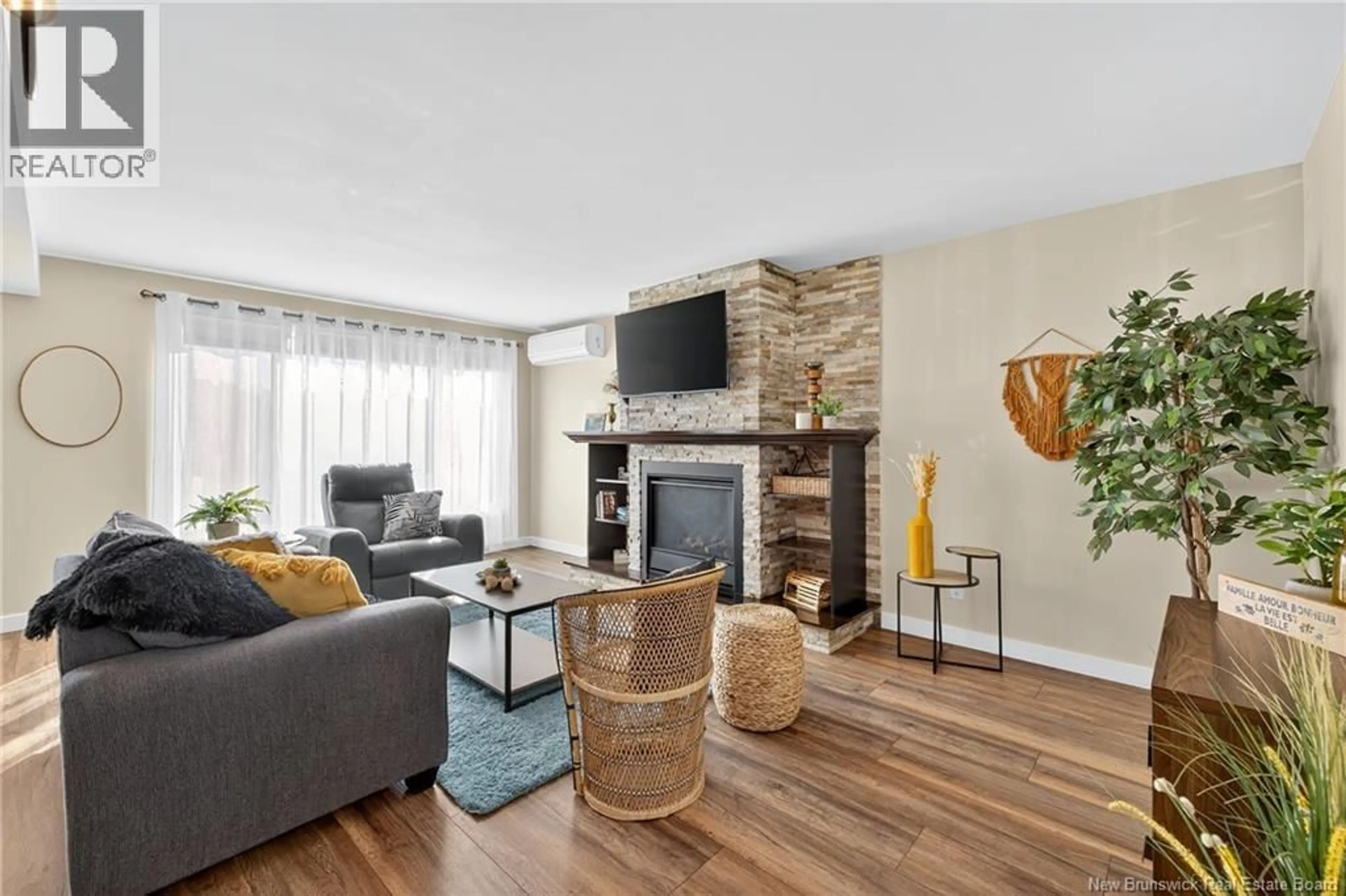 Living room with furniture, wood/laminate floor for 470 RUE ACADIE STREET, Grande-Anse New Brunswick E8N1E4