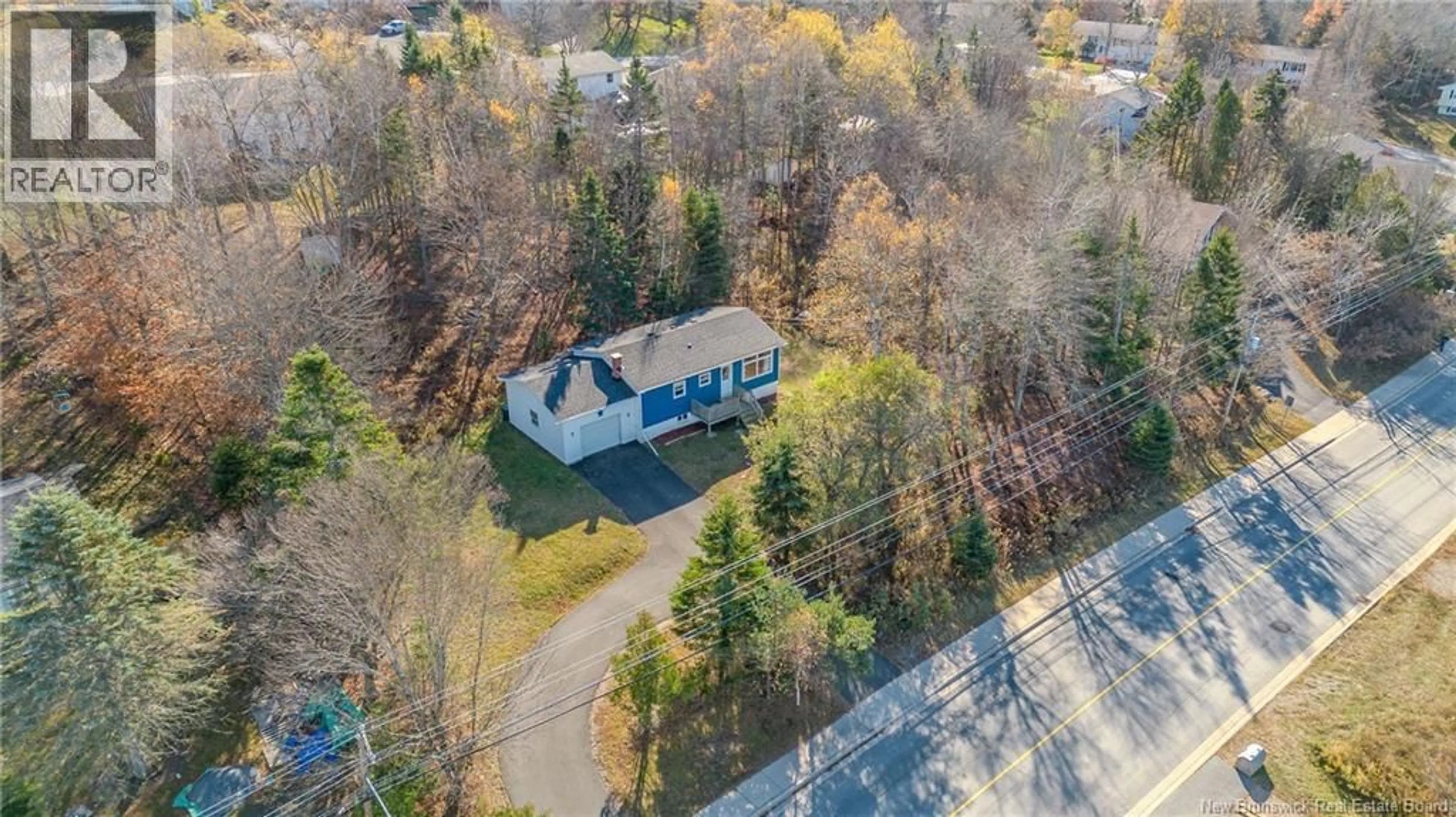 A pic from outside/outdoor area/front of a property/back of a property/a pic from drone, street for 126 VINCENT ROAD, Quispamsis New Brunswick E2E1S8