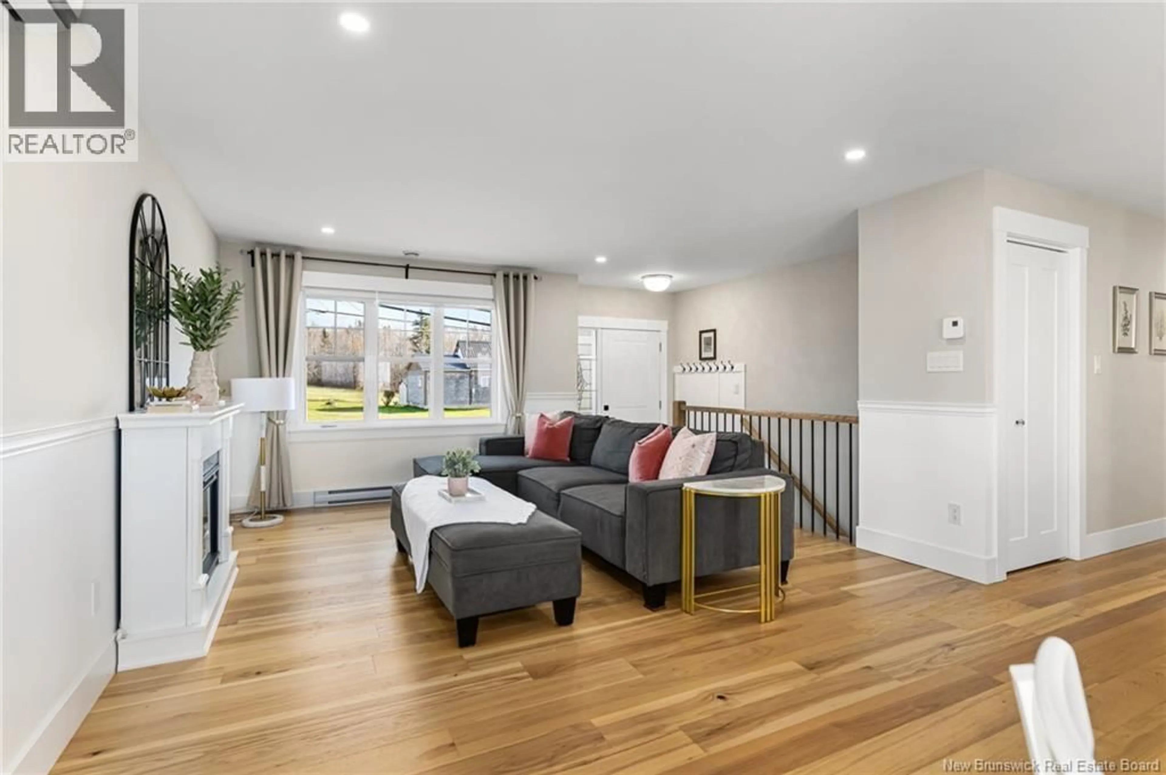 Living room with furniture, wood/laminate floor for 351 DOVER ROAD, Dieppe New Brunswick E1A7L5