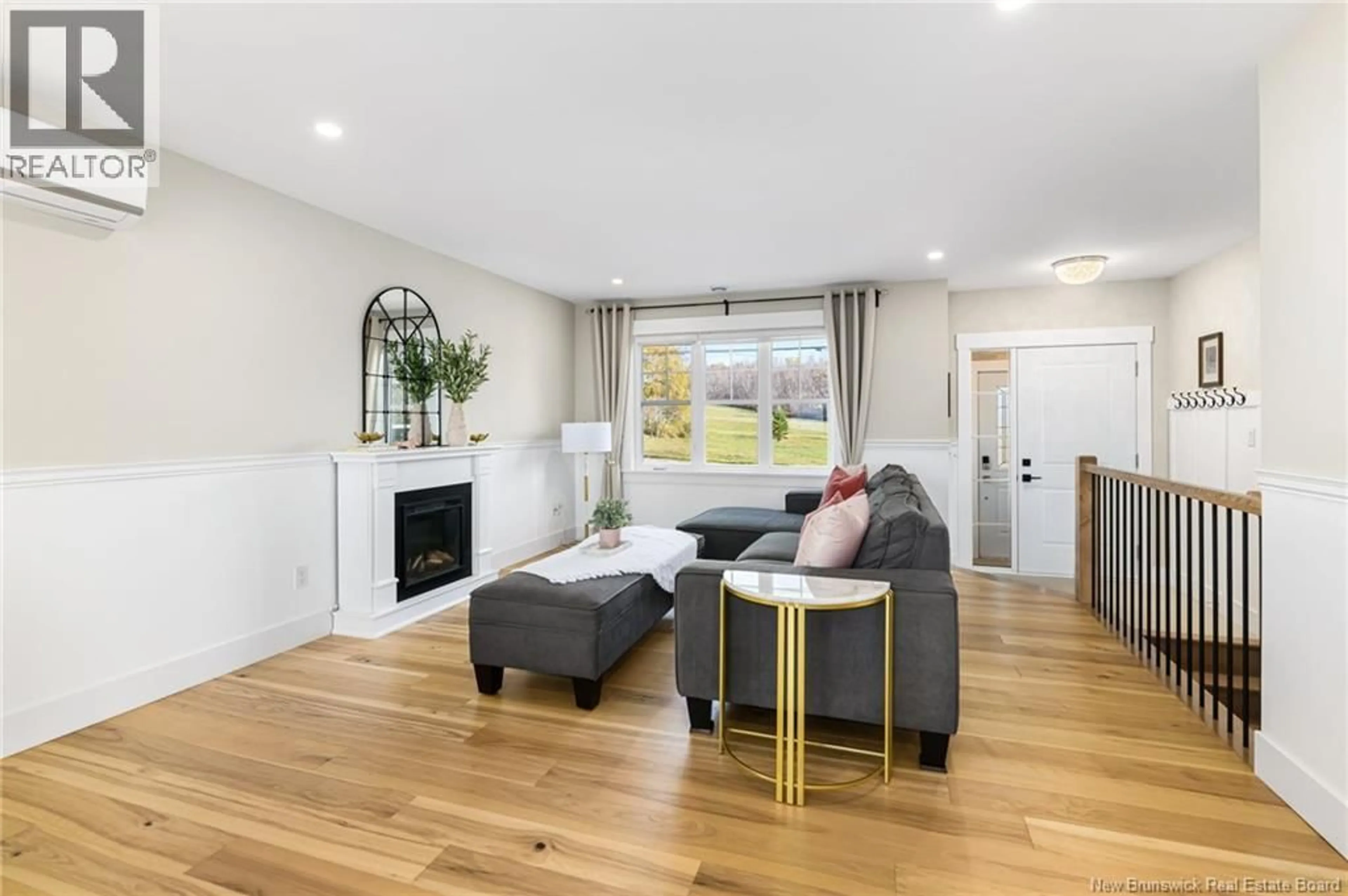 Living room with furniture, wood/laminate floor for 351 DOVER ROAD, Dieppe New Brunswick E1A7L5