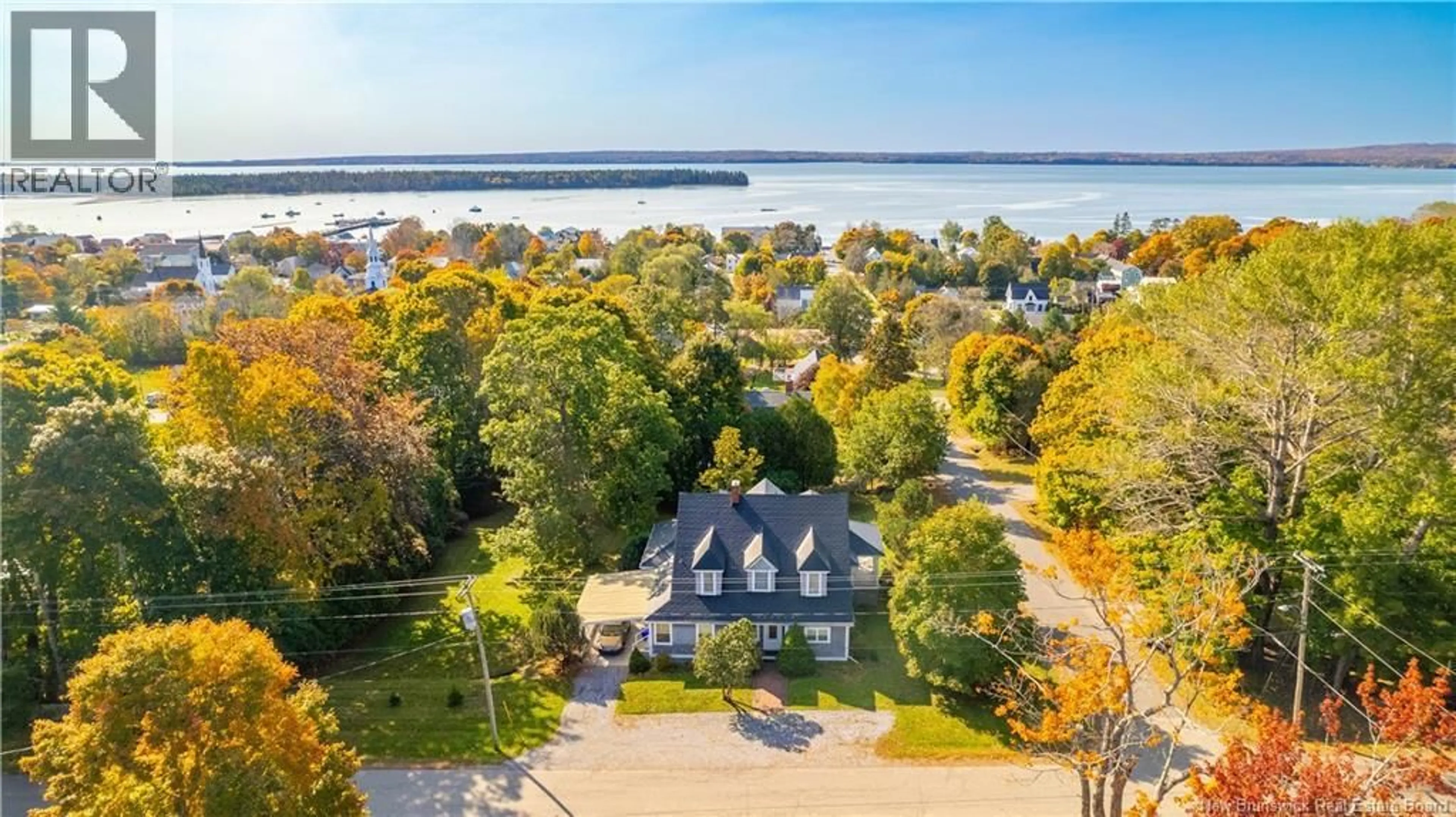 A pic from outside/outdoor area/front of a property/back of a property/a pic from drone, water/lake/river/ocean view for 101 CARLETON STREET, Saint Andrews New Brunswick E5B1N1