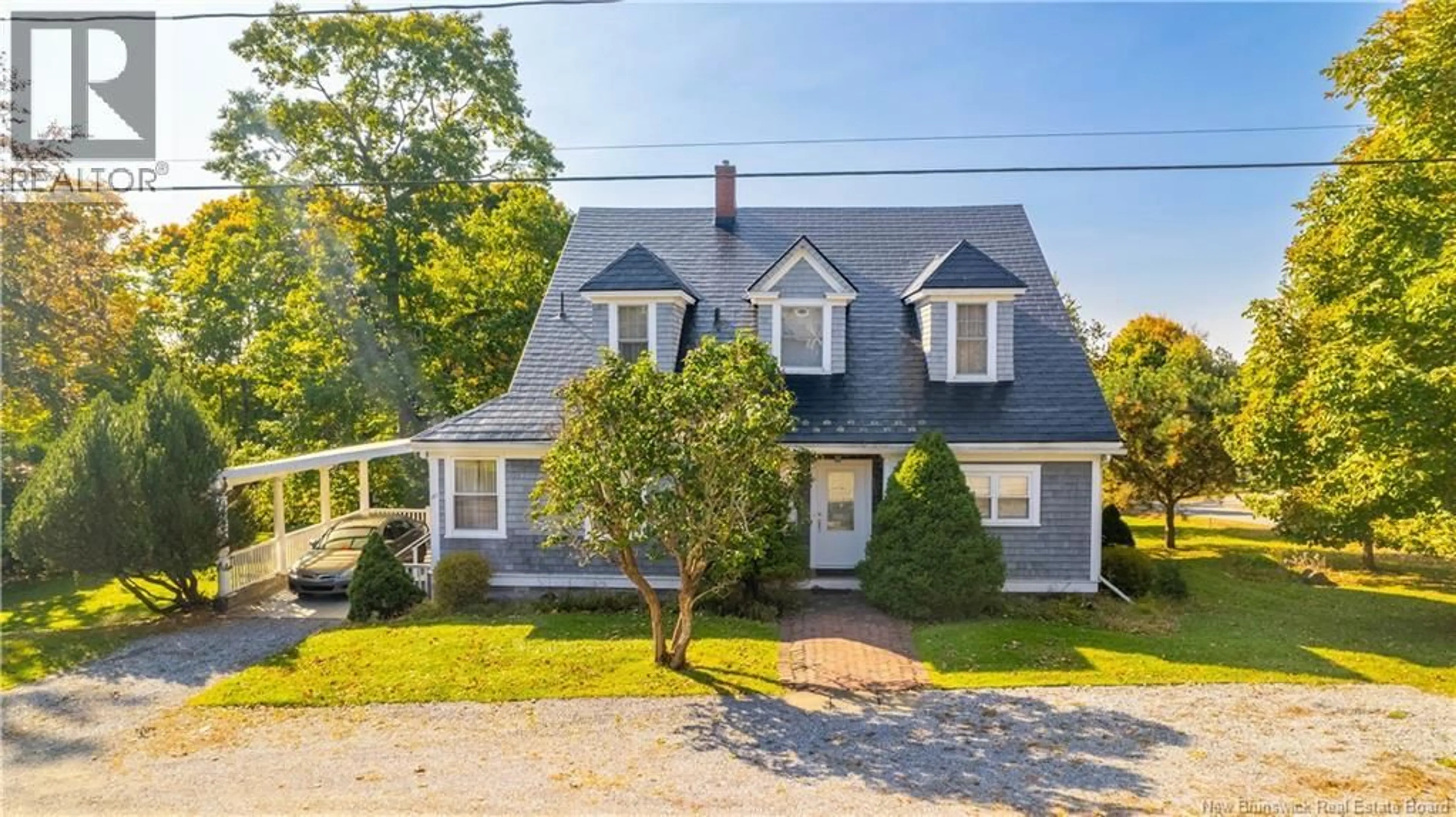 A pic from outside/outdoor area/front of a property/back of a property/a pic from drone, street for 101 CARLETON STREET, Saint Andrews New Brunswick E5B1N1