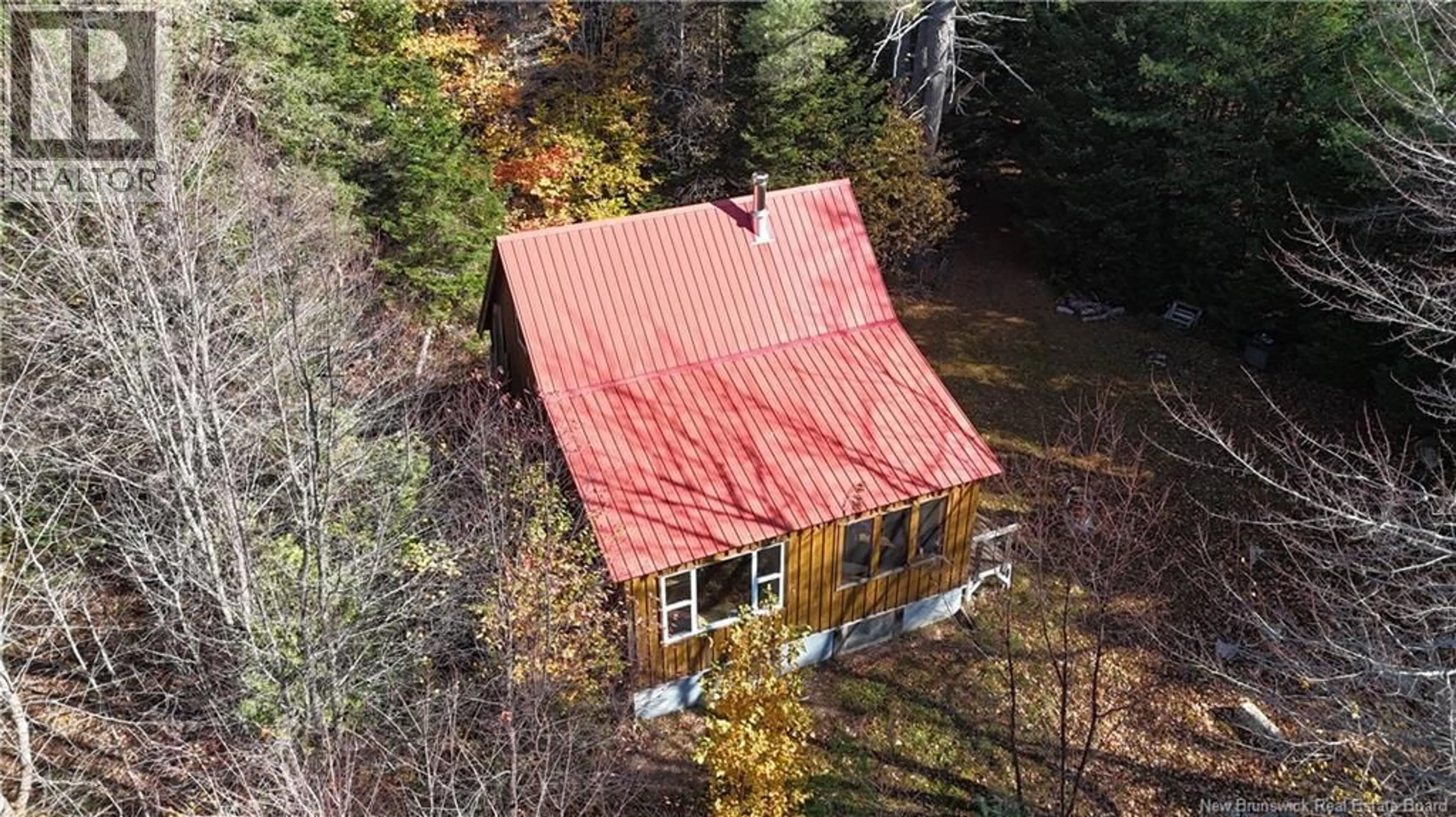 A pic from outside/outdoor area/front of a property/back of a property/a pic from drone, building for 92-5 LOON BAY ROAD, Saint James New Brunswick E5A1H8