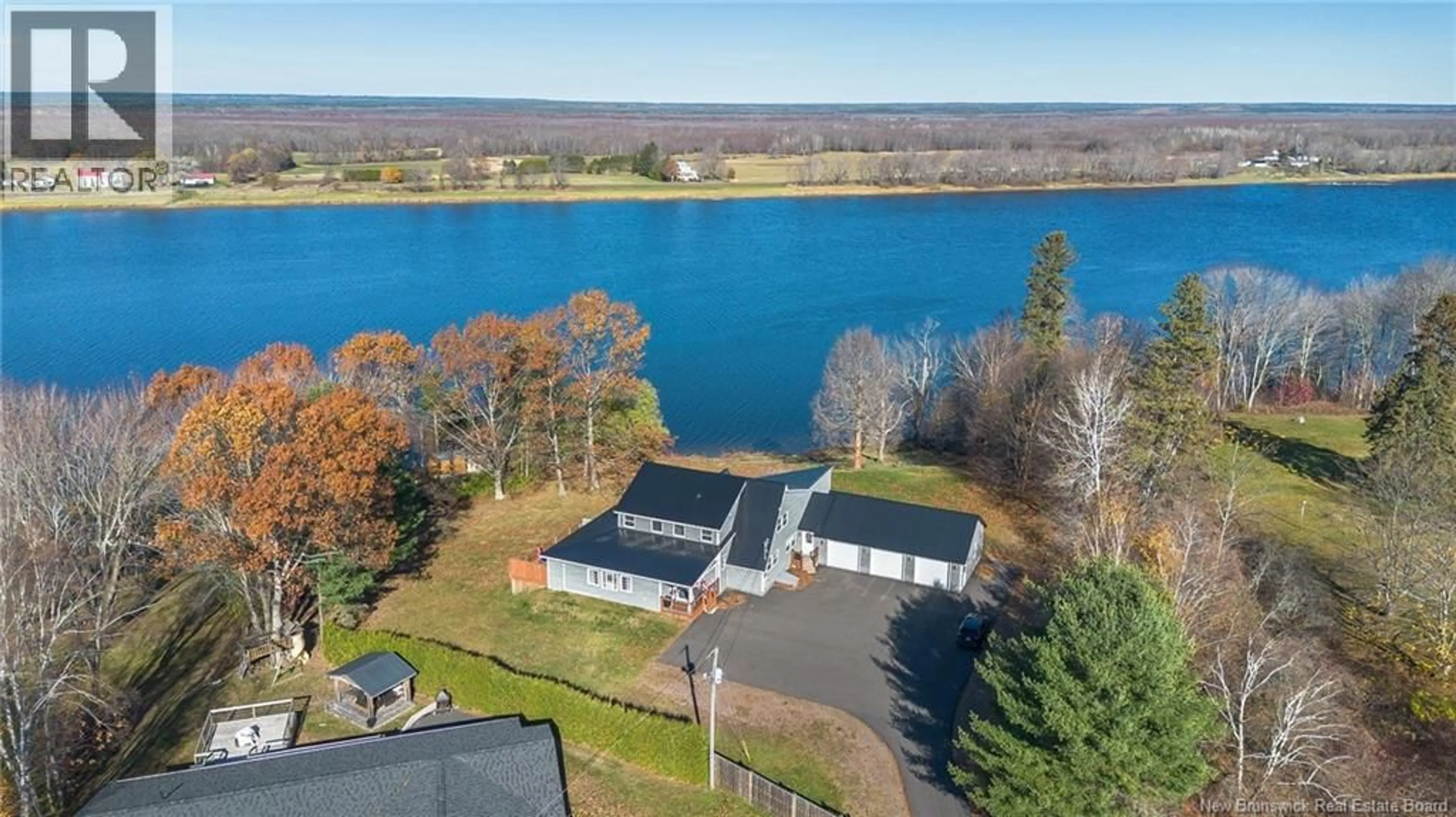 A pic from outside/outdoor area/front of a property/back of a property/a pic from drone, water/lake/river/ocean view for 405 ROUTE 102, Burton New Brunswick E2V3J8