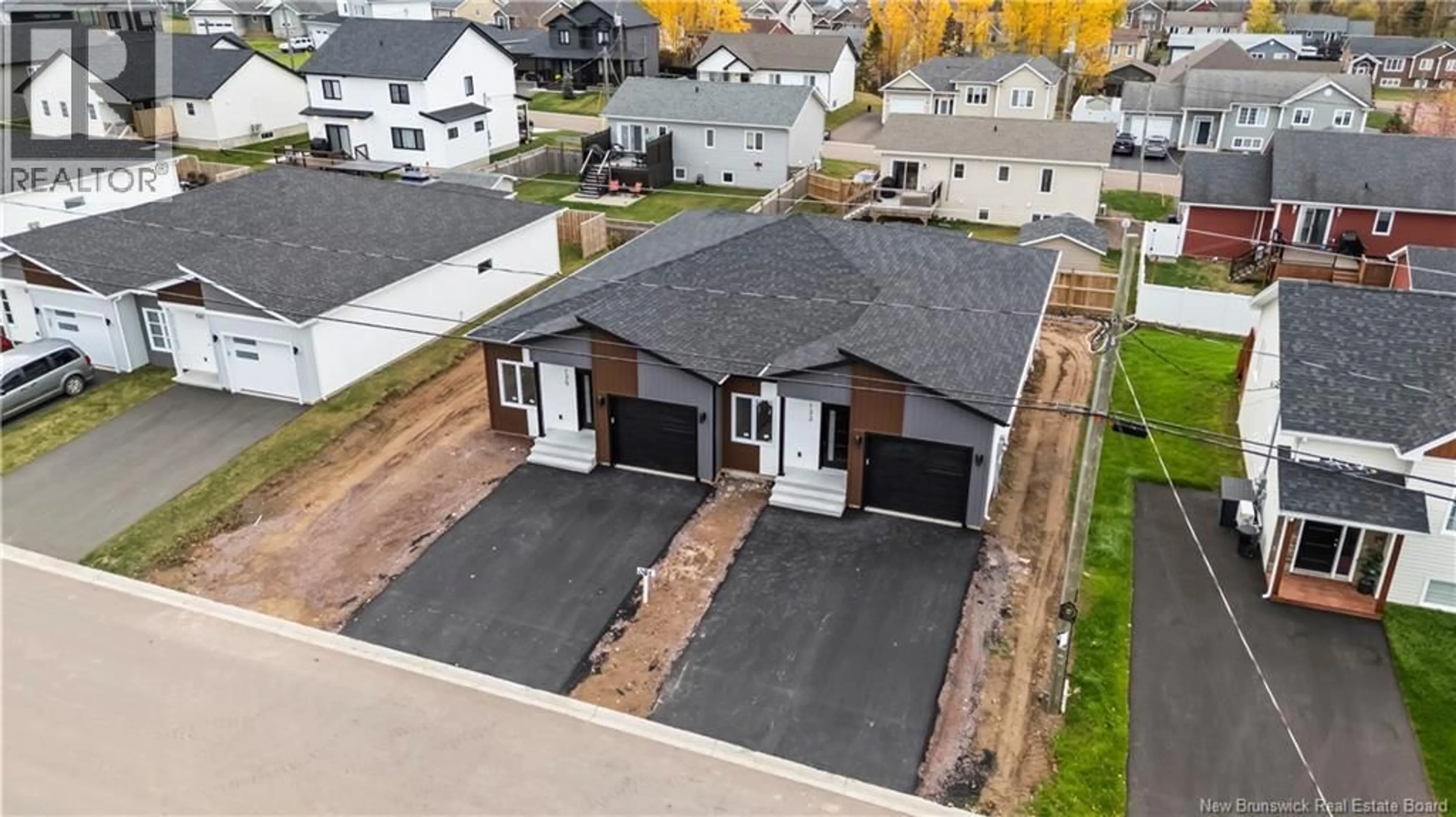 A pic from outside/outdoor area/front of a property/back of a property/a pic from drone, street for 133 MONIQUE ST, Shediac New Brunswick E4P2M5