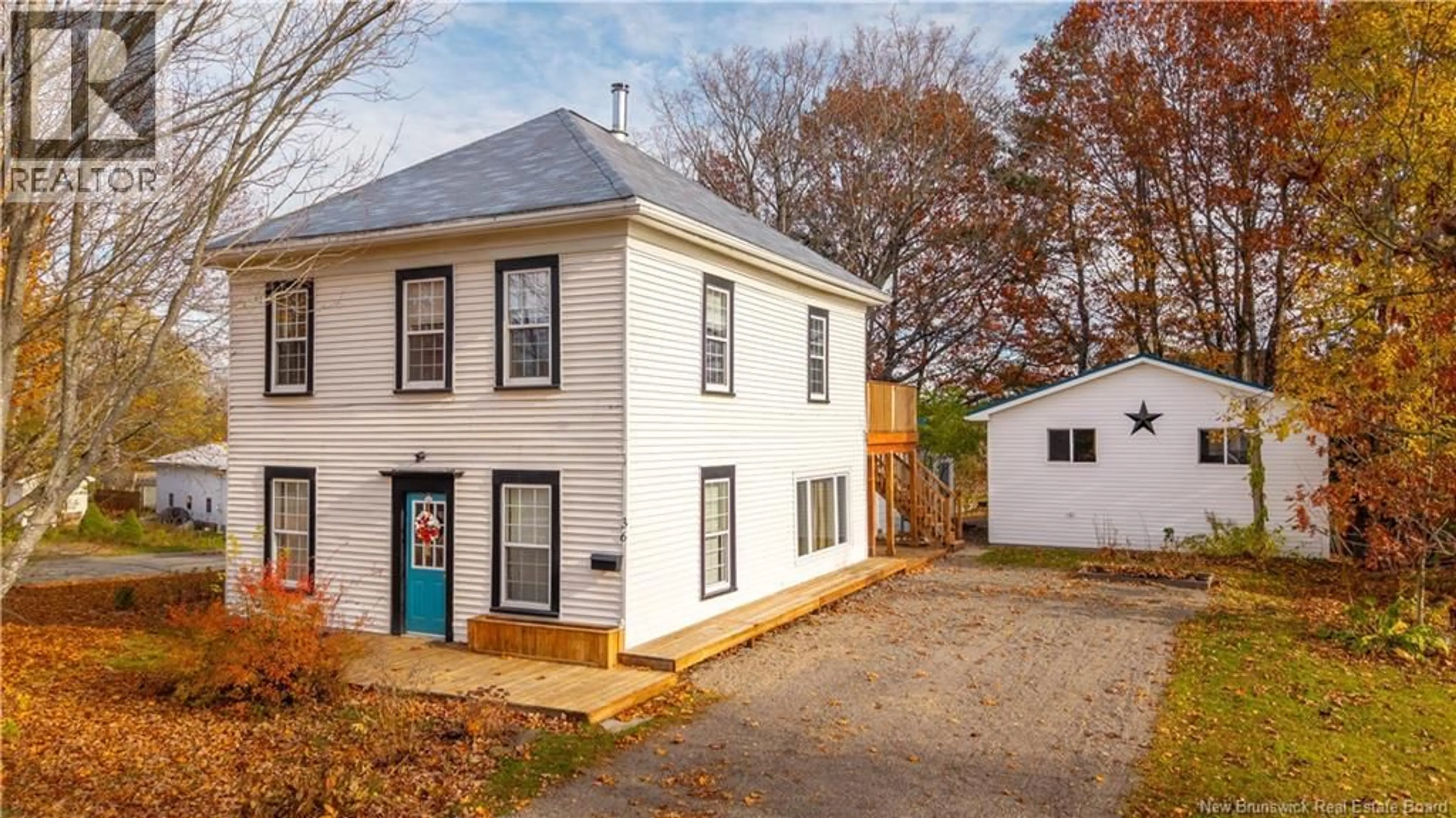 Home with vinyl exterior material, street for 36 QUEENSWAY WAY, St. Stephen New Brunswick E3L1N4