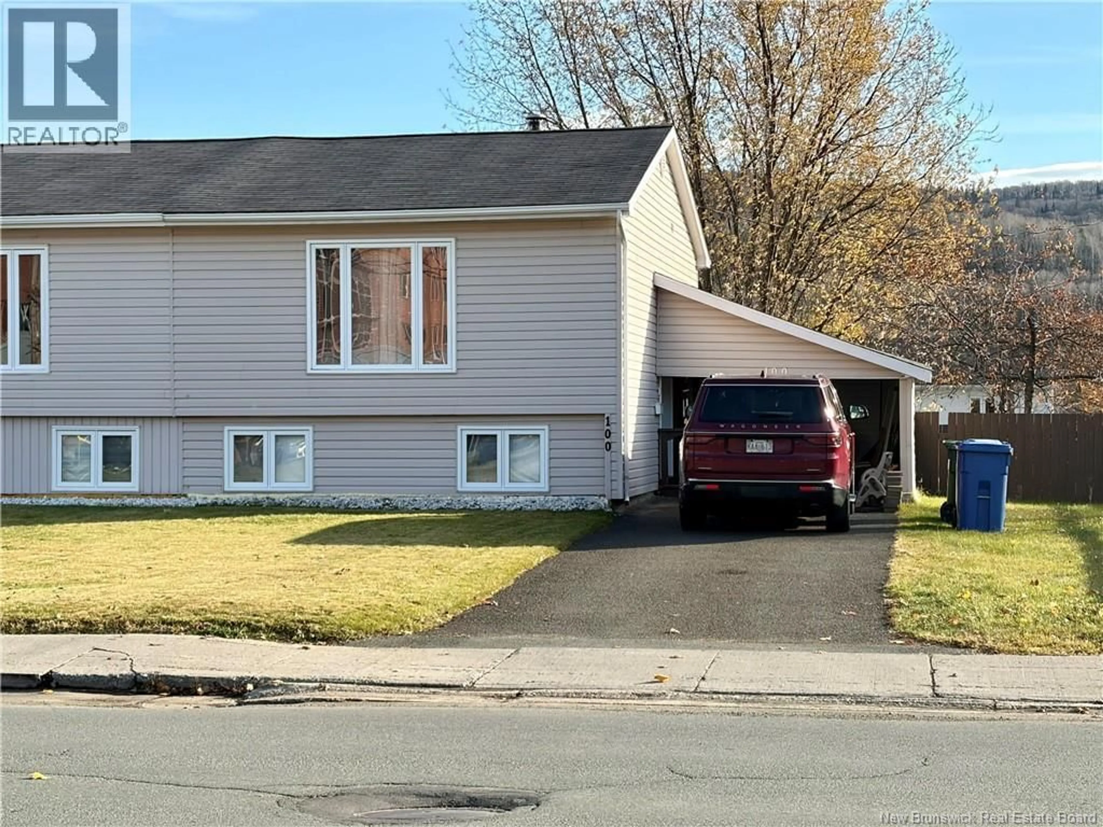 Home with vinyl exterior material, street for 100 DOVER, Campbellton New Brunswick E3N1P8
