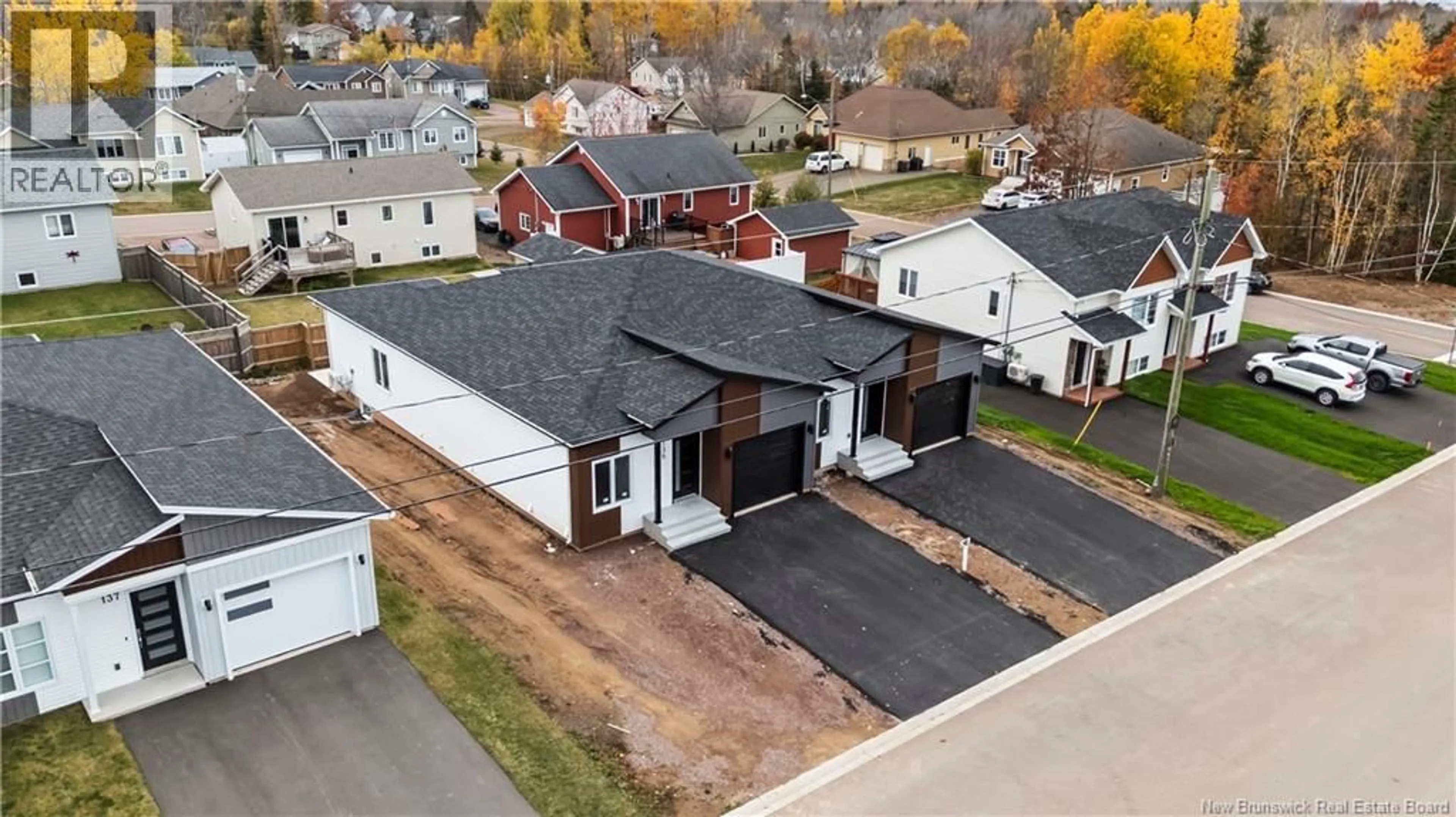 A pic from outside/outdoor area/front of a property/back of a property/a pic from drone, street for 135 MONIQUE ST, Shediac New Brunswick E4P2M5