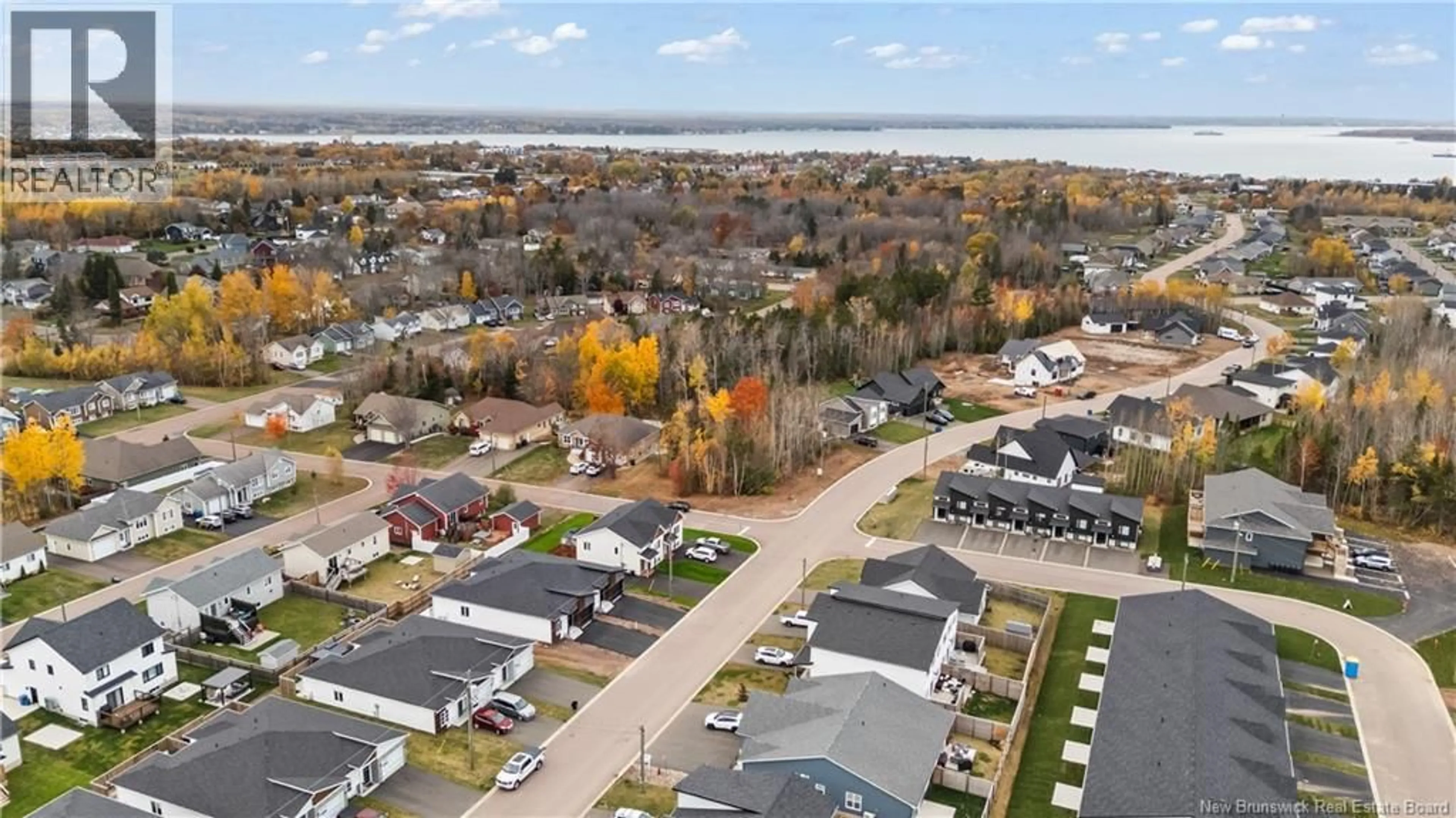 A pic from outside/outdoor area/front of a property/back of a property/a pic from drone, water/lake/river/ocean view for 135 MONIQUE ST, Shediac New Brunswick E4P2M5