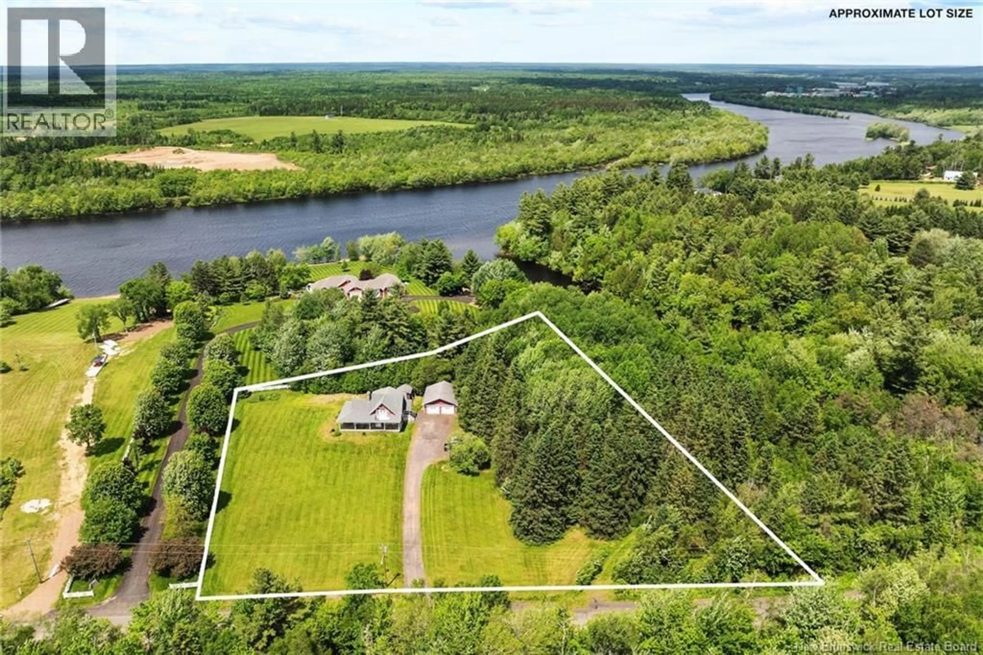 A pic from outside/outdoor area/front of a property/back of a property/a pic from drone, water/lake/river/ocean view for 126 WEGESEGUM ROAD, Coal Creek New Brunswick E4A2P9
