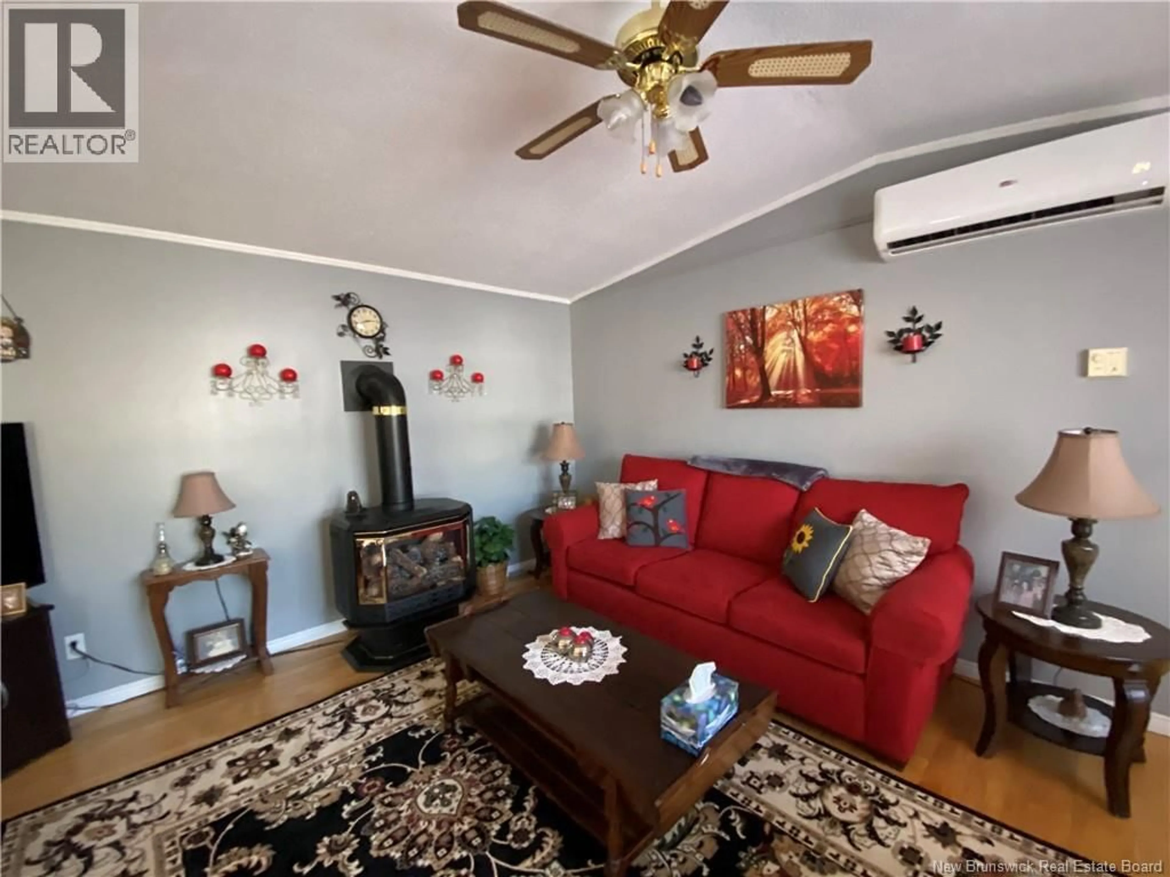 Living room with furniture, wood/laminate floor for 24 MONTREUX STREET, Moncton New Brunswick E1H2Y9