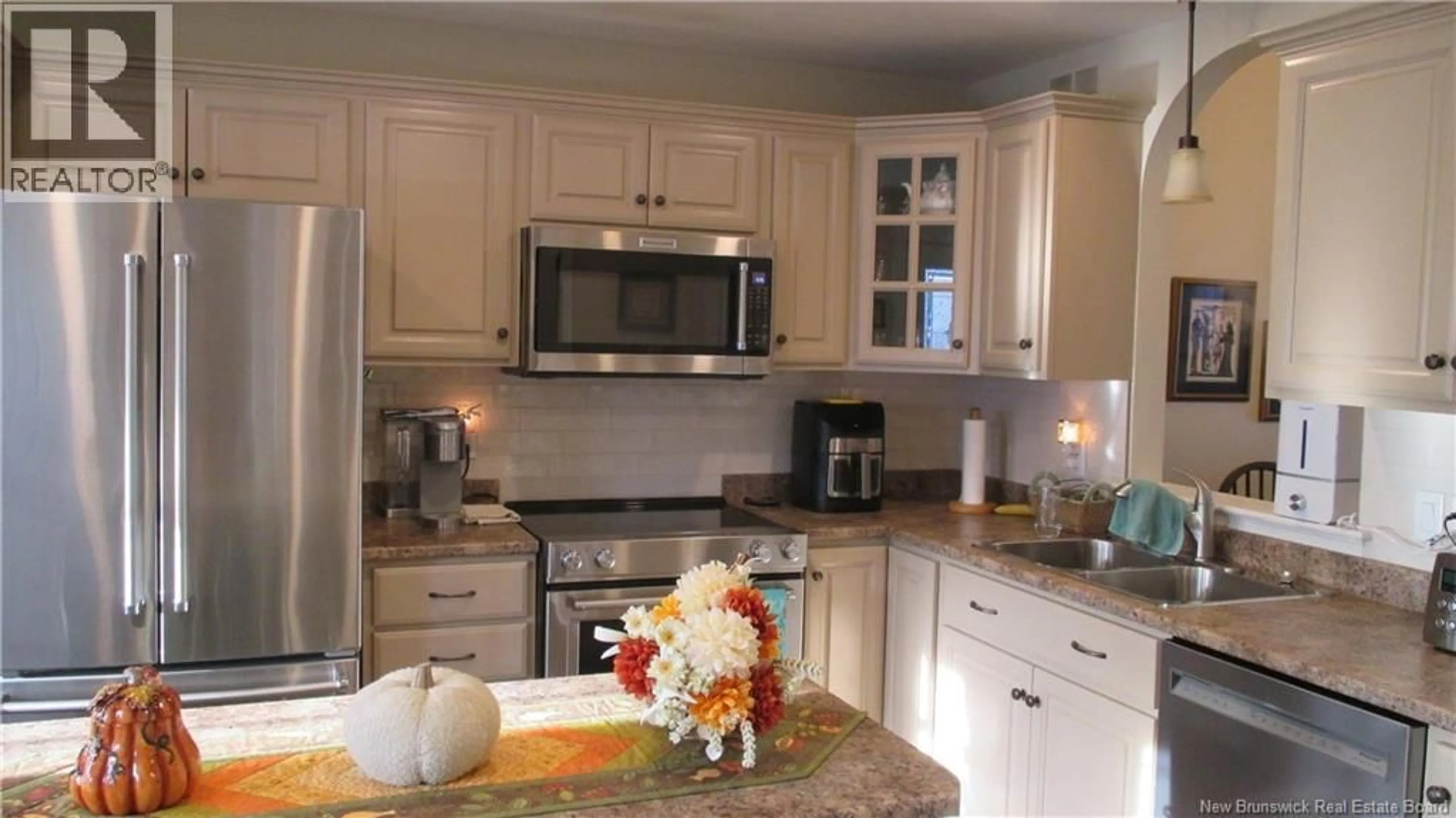 Open concept kitchen, ceramic/tile floor for 109 AMBERLY COURT, Riverview New Brunswick E1B0H4