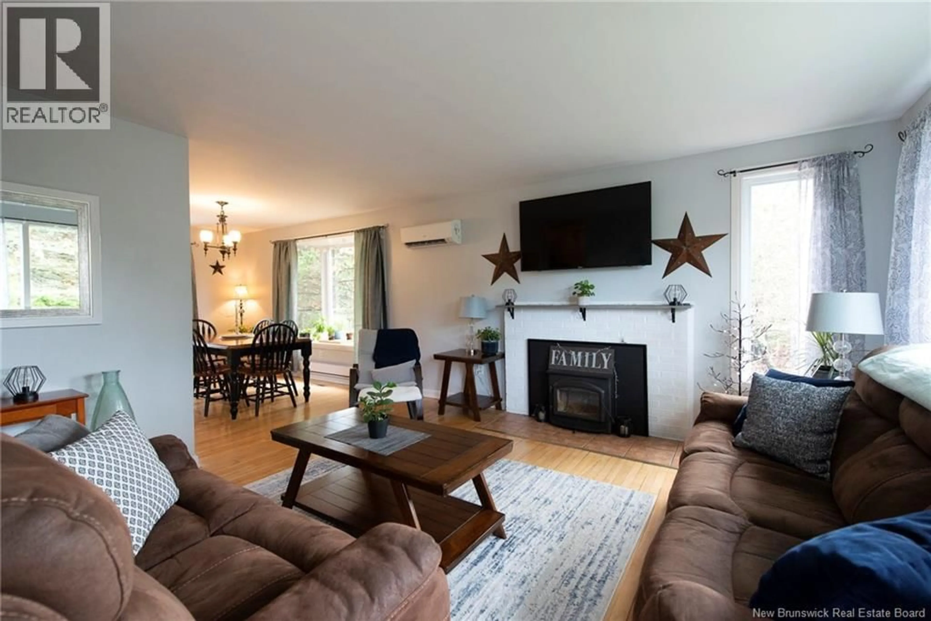 Living room with furniture, wood/laminate floor for 1104 KENNEBECASIS DRIVE, Saint John New Brunswick E2K5B1